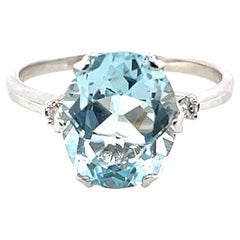 Contemporary 4.25 Carat Oval Aquamarine and Diamond Accent White Gold Ring