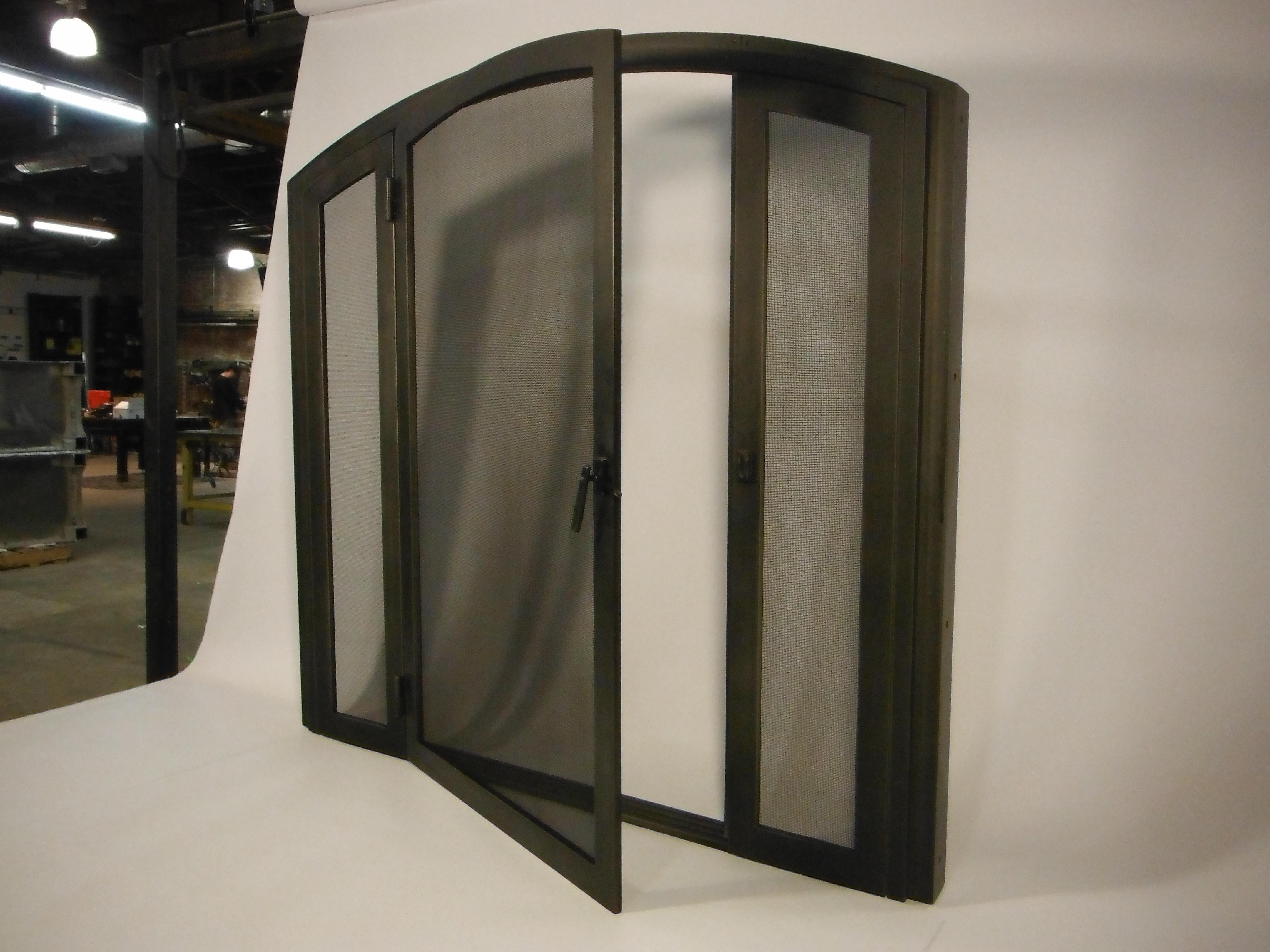 Patinated Custom Shaped Artisanal Fireplace Screen Door For Sale