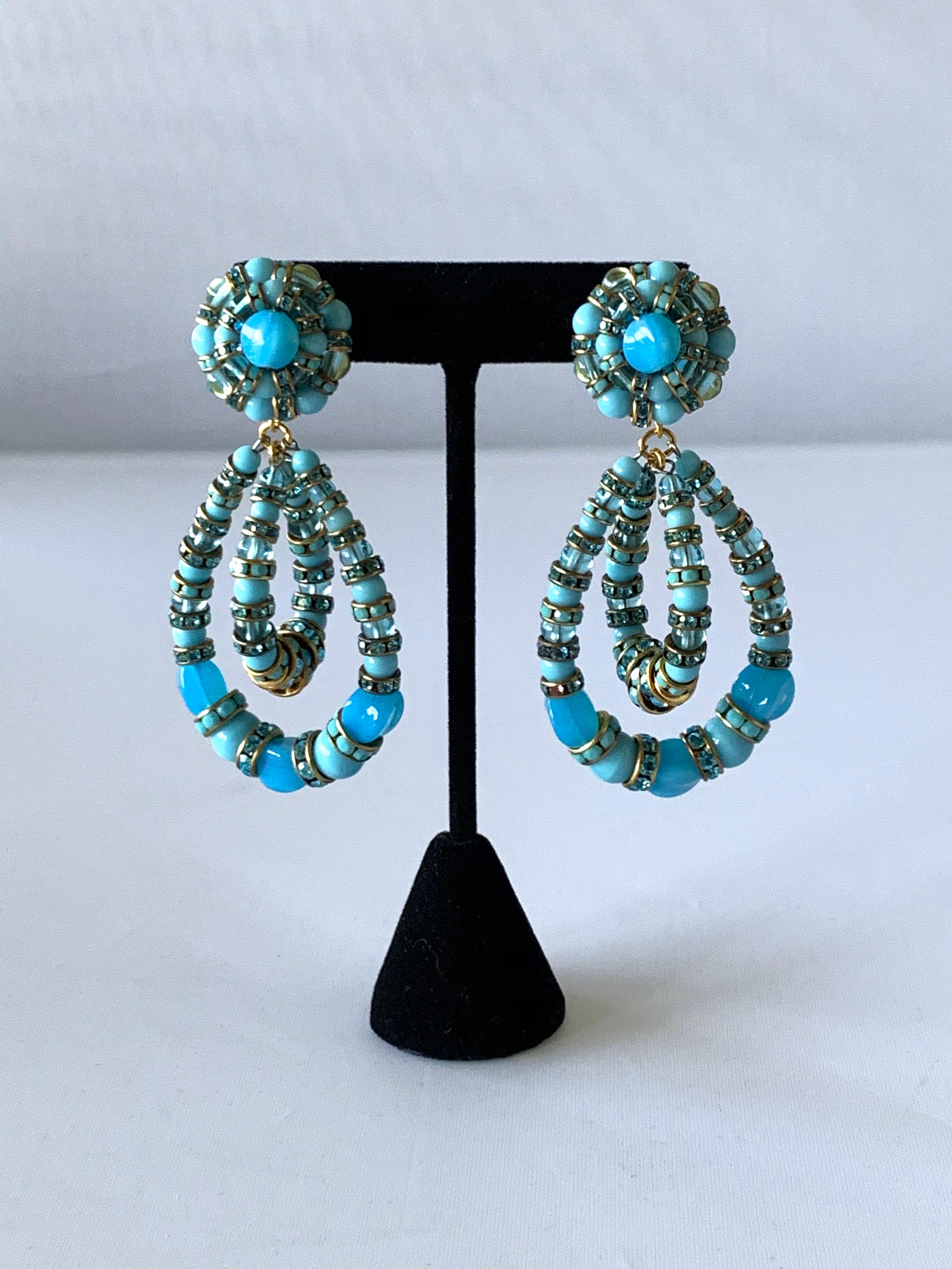 Contemporary handmade turquoise architectural Swarovski crystal statement earrings - the clip-on earrings feature two double hoops with handmade multi turquoise glass beads and Swarovski crystal rondelles. Made in Paris France, by F. Montague.

