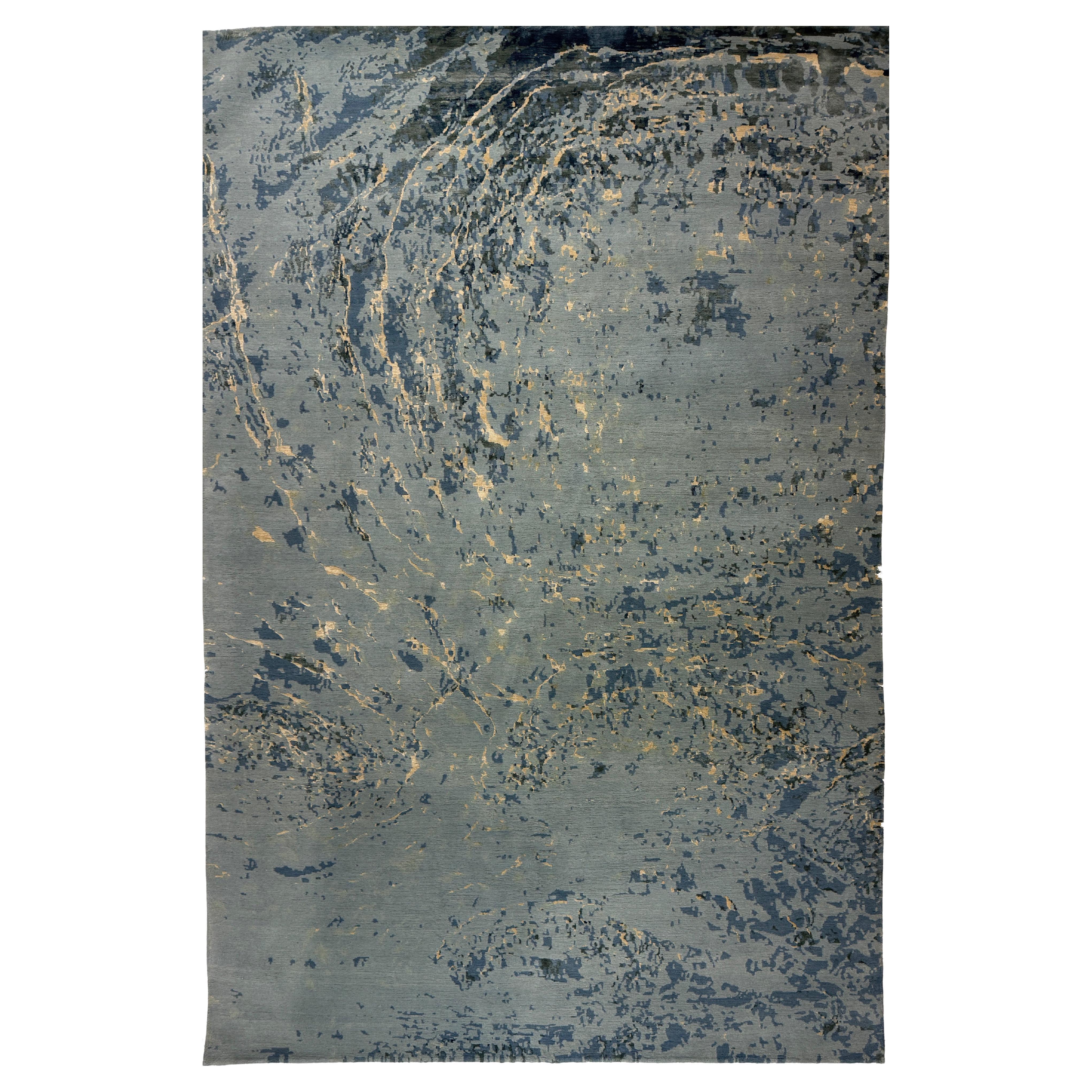Tapis de zone contemporain en bleu, fait à la main en soie et en laine, 150 nœuds "Oceans"