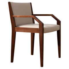Poltrona contemporanea in Wood Wood esotico e pelle avvolta di Costantini, Giovanni