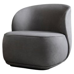Fauteuil contemporain 'La Pipe Lounge' en cuir, nubuck royal, 'Fixed'.
