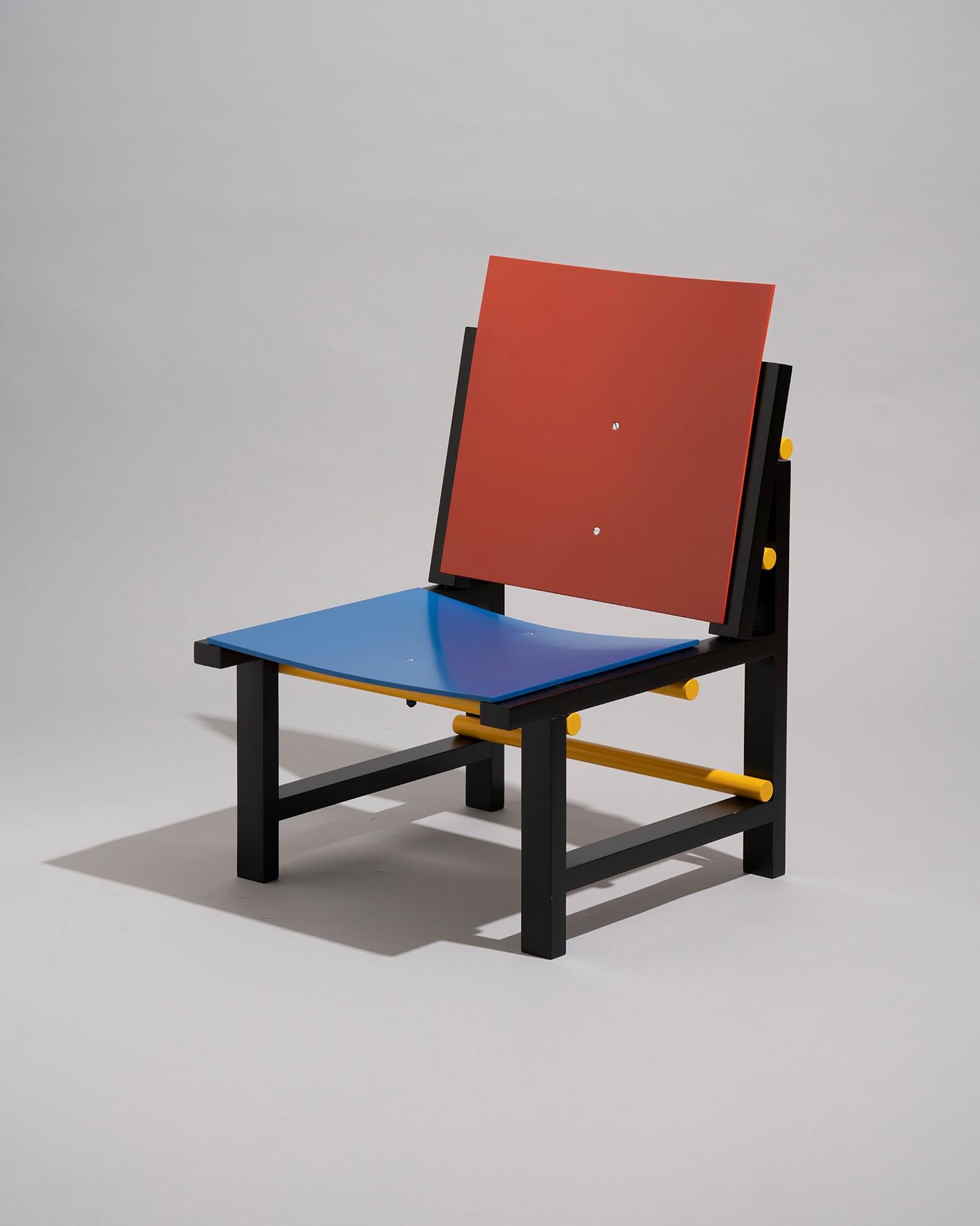 Lacquered Modern contemporary armchair in red blue yellow black wood by Marc Morro For Sale