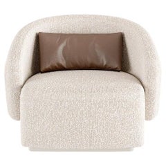 Contemporary Fully Upholstered Lounge Chair with Curved Seamless Silhouette