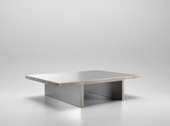 Table basse contemporaine Arris en acier et travertin