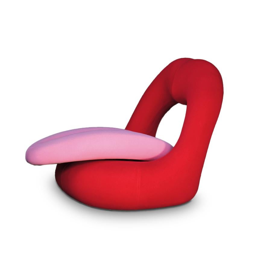 Chair, metal, polyurethane, fabric, with mechanism for tongue movement.