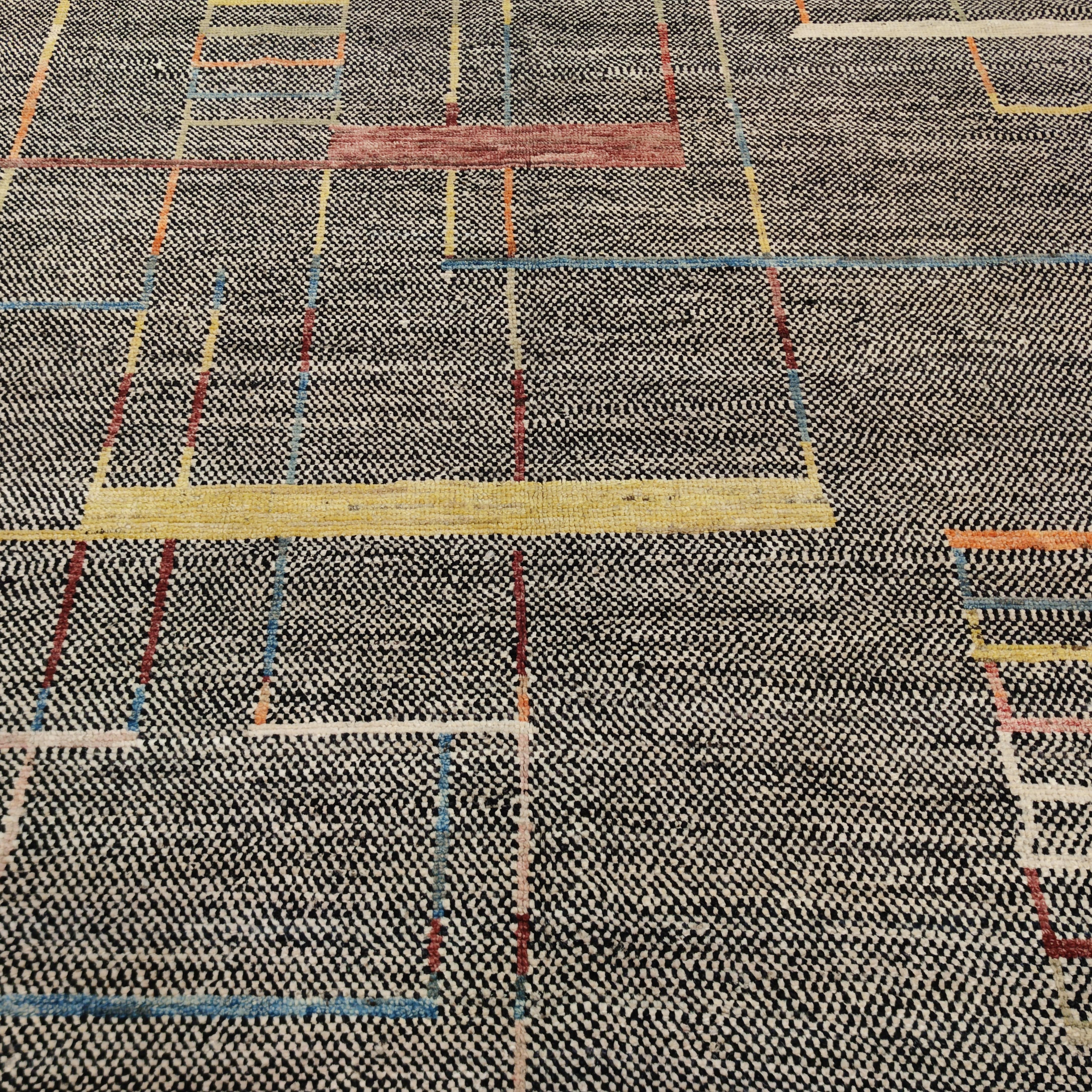 Ein sehr feiner Teppich mit geometrischem Muster im kubistischen Stil, der charakteristisch für die Teppiche ist, die Ivan Da Silva Bruhns für die prestigeträchtigsten Art-Déco-Interieurs der Epoche entwarf. Verschiedene rechteckige Flächen