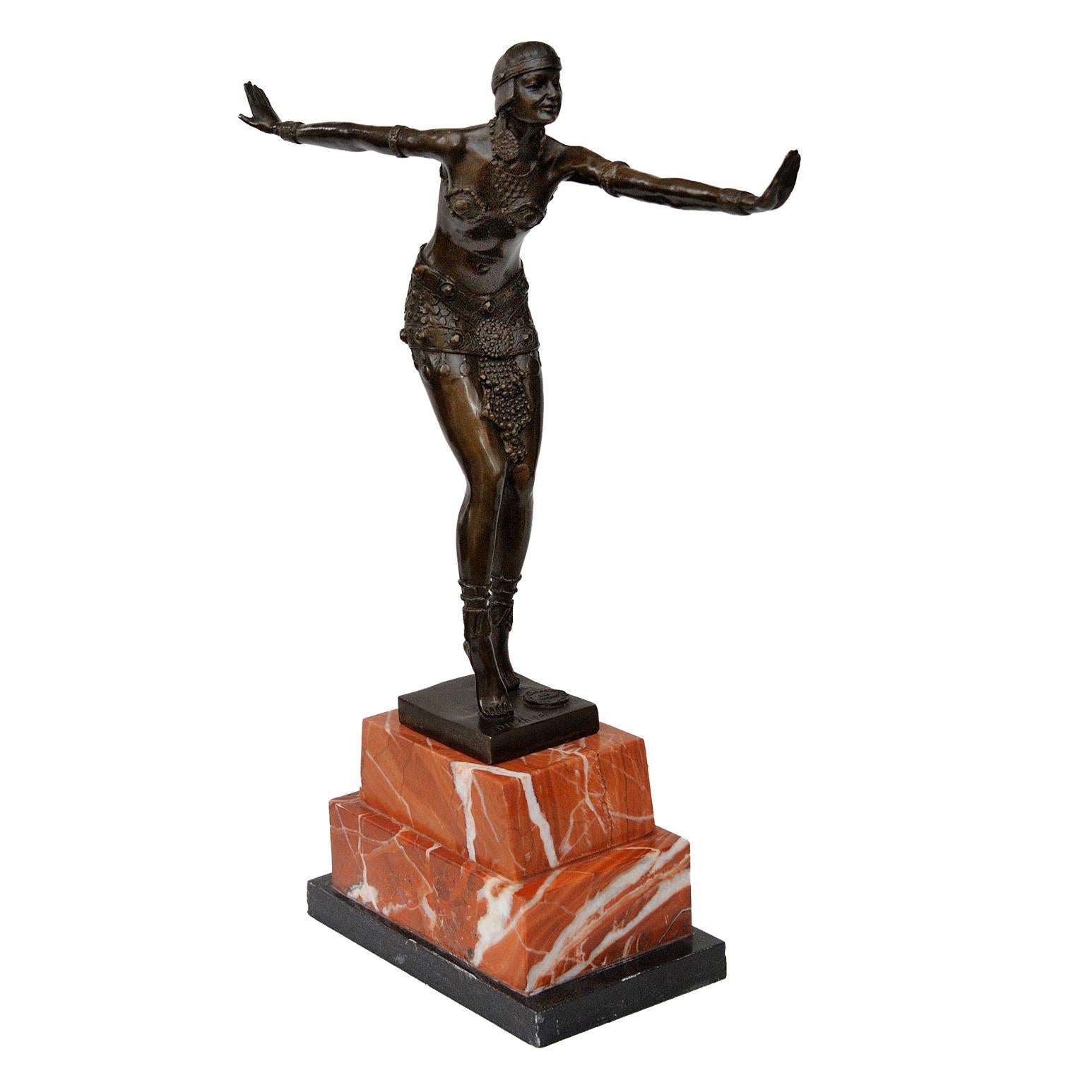 This is a most pleasing contemporary Art Deco style bronze of a dancer, standing on a stepped marble base, after DH Chiparus. With engraved signature and bearing stamp 'Bronze Garanti Paris J.B. Deposee'. Bearing the number A7255. 

A lovely