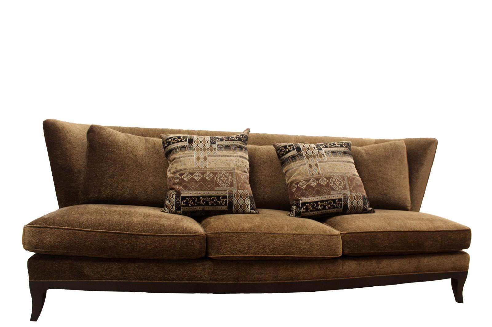 We present this beautiful art deco style sofa by Donghia called the Geneva sofa, in a chocolate brown chenille upholstery with mahogany wood flared legs. In excellent condition. Dimensions: 89.5