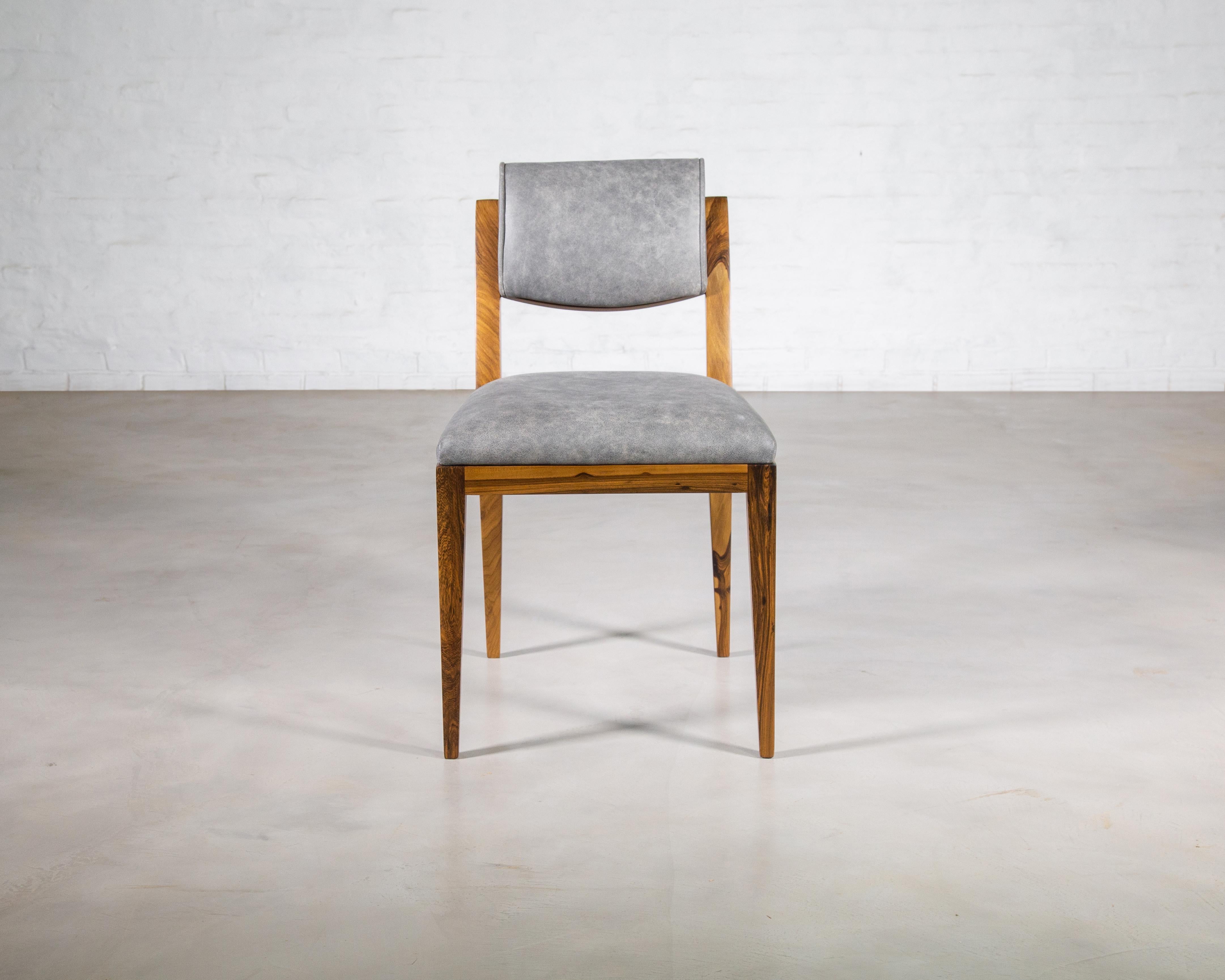 The Gianni Dining Chair borrows cues from the early-20th century Art Deco masters and features a light frame with a scrolled back. Shown in ebonized Argentine Rosewood and leather. 

About Costantini Design

Costantini is a furniture design and
