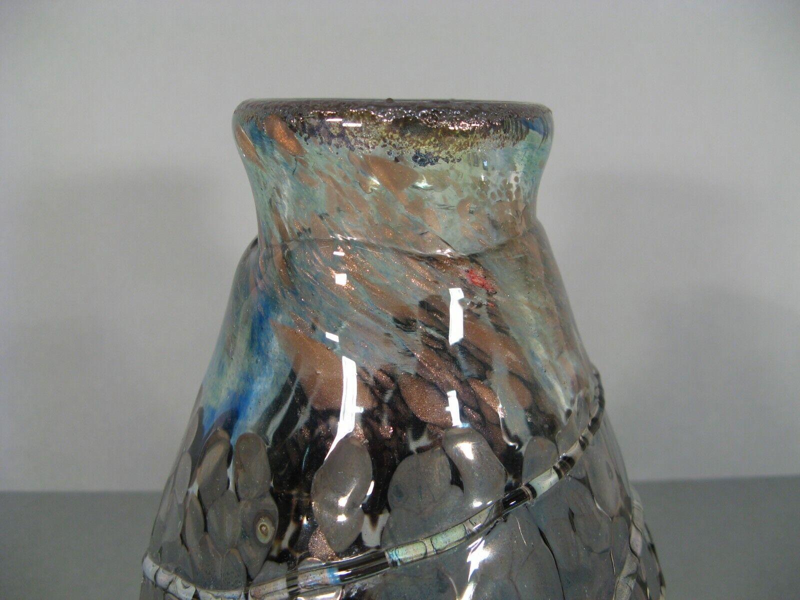 This stunning contemporary art glass vase by master glassmaker Daniel Baroy features an abstract design with bluish, gray, and brown tones. Signed and dated 