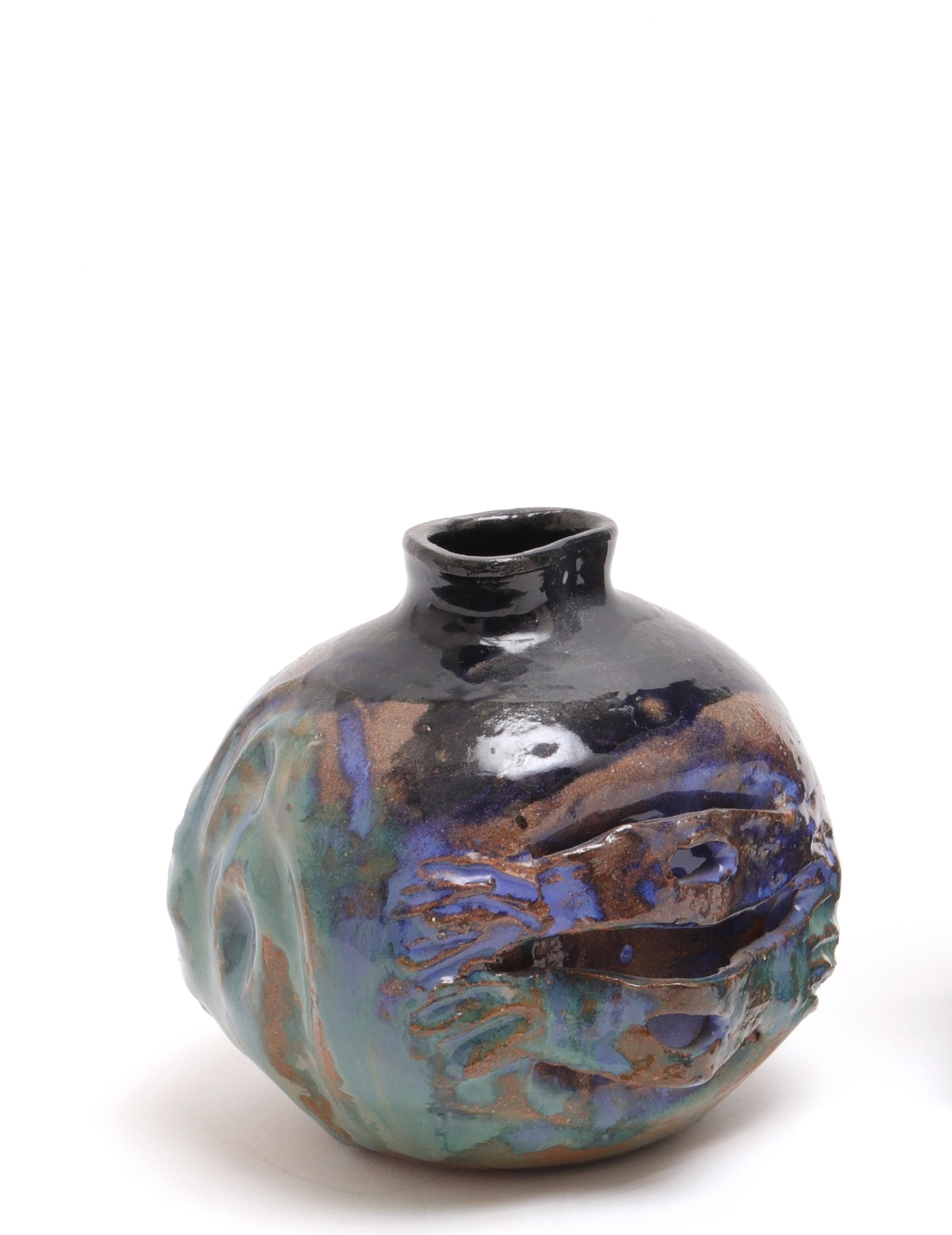 Contemporary art pottery round vase with blue green glaze, bearing illegible signature to underside.