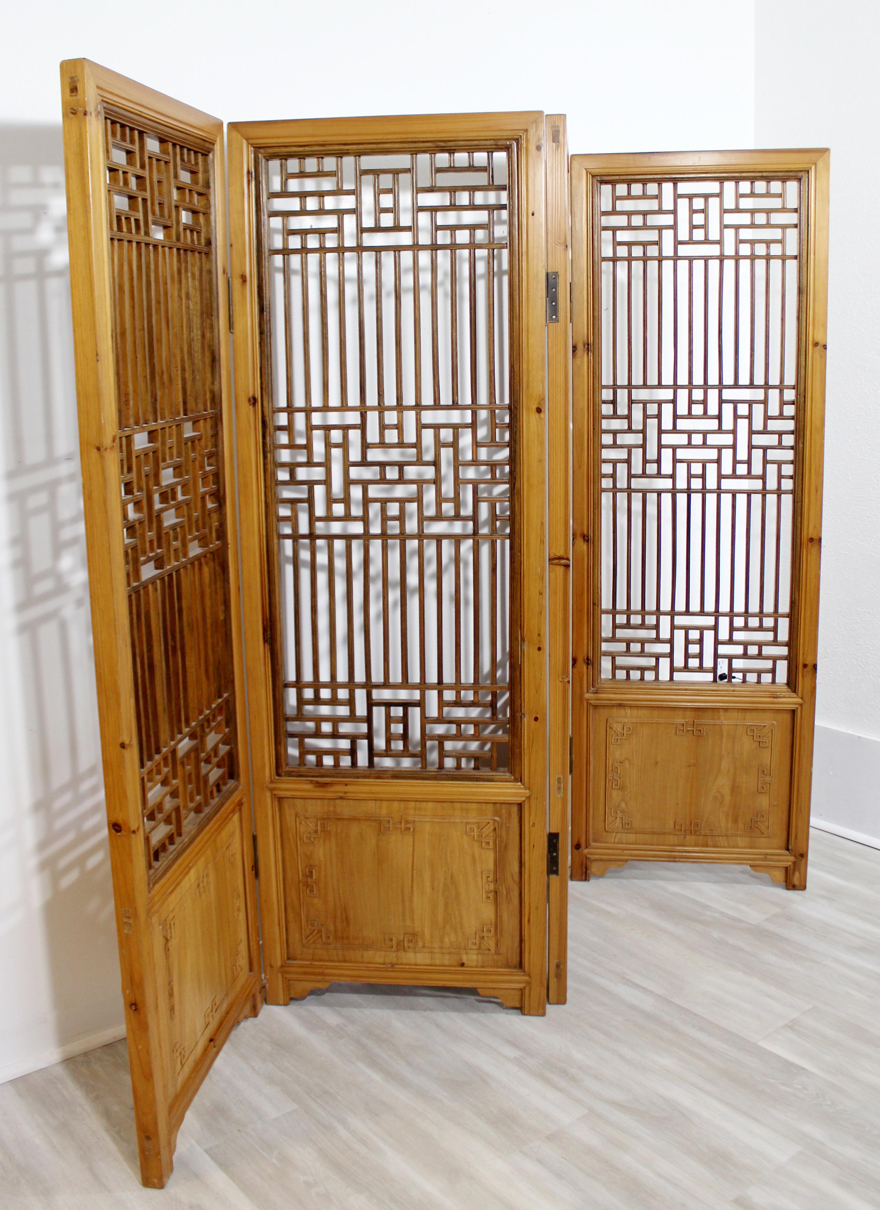 For your consideration is a splendid, Asian, carved wood, four panel screen or room divider, circa 1990s. In very good condition. Each panel is 22