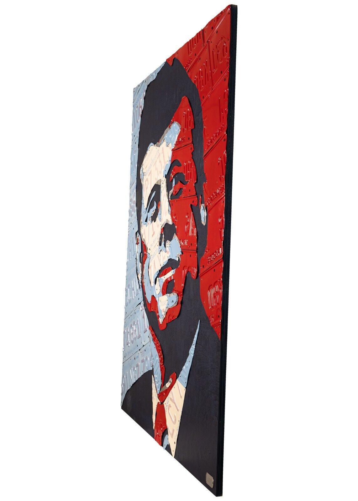 Recycled vintage red, light blue, and silver license plates from JFK's home state of Massachusetts are repurposed to create this amazing one-of-a-kind portrait of this beloved and iconic President. The fifth in this popular series follows the
