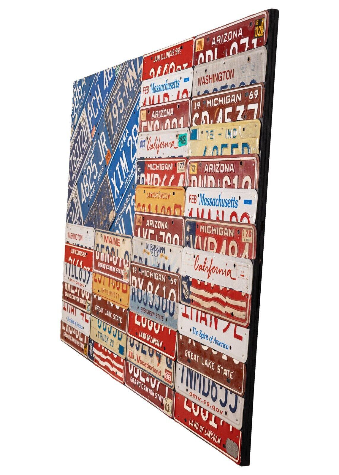 Celebrate our nation's rich automotive history with an impressive flag of the United States made completely from vintage license plates from various states. Each one in this ongoing series is unique and repurposes red, white and blue plates in a