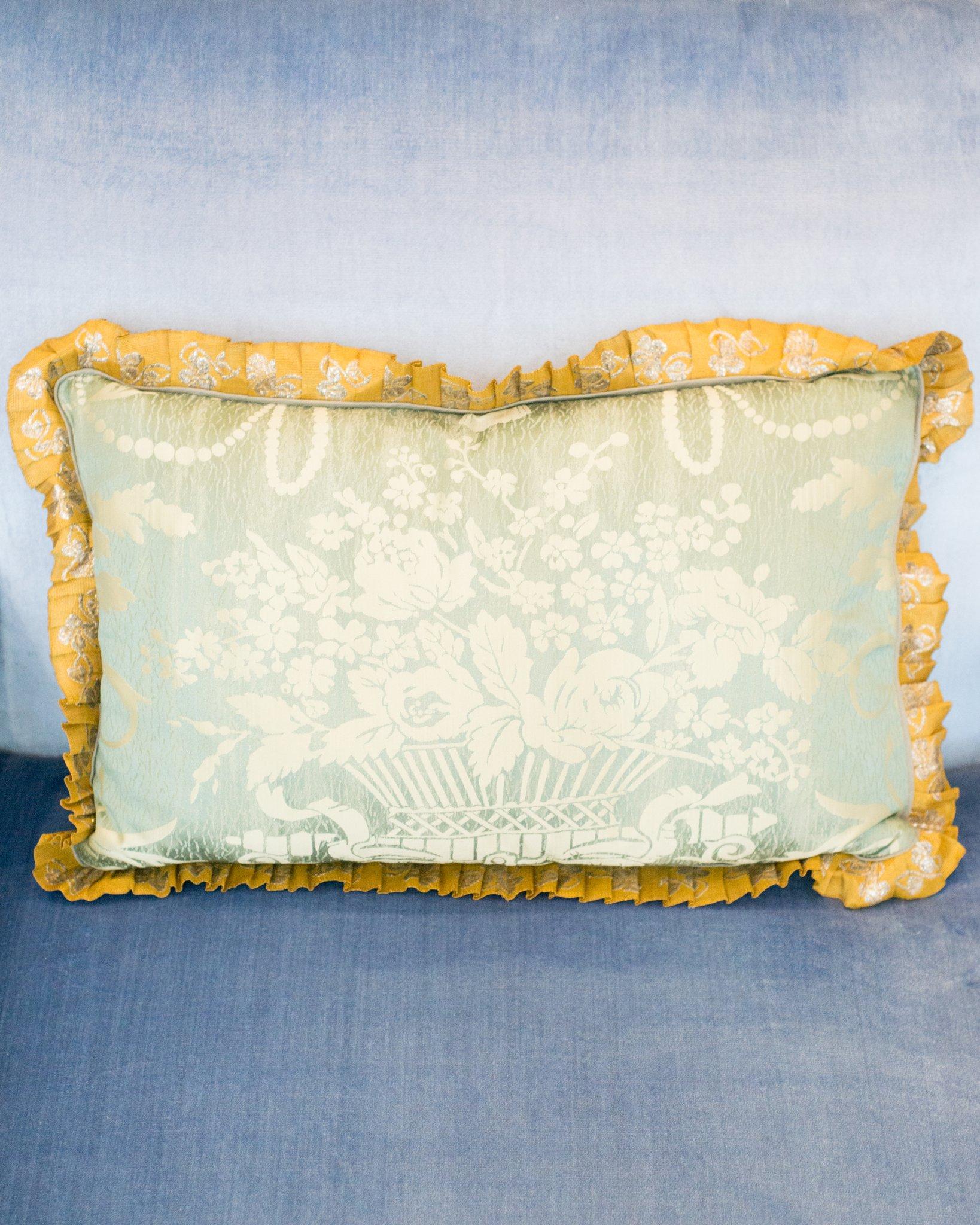 A beautiful pair of asymmetric pale blue damask silk pillows with metallic lace border and linen backing. Filled with 100% Canadian Down and Feather insert.