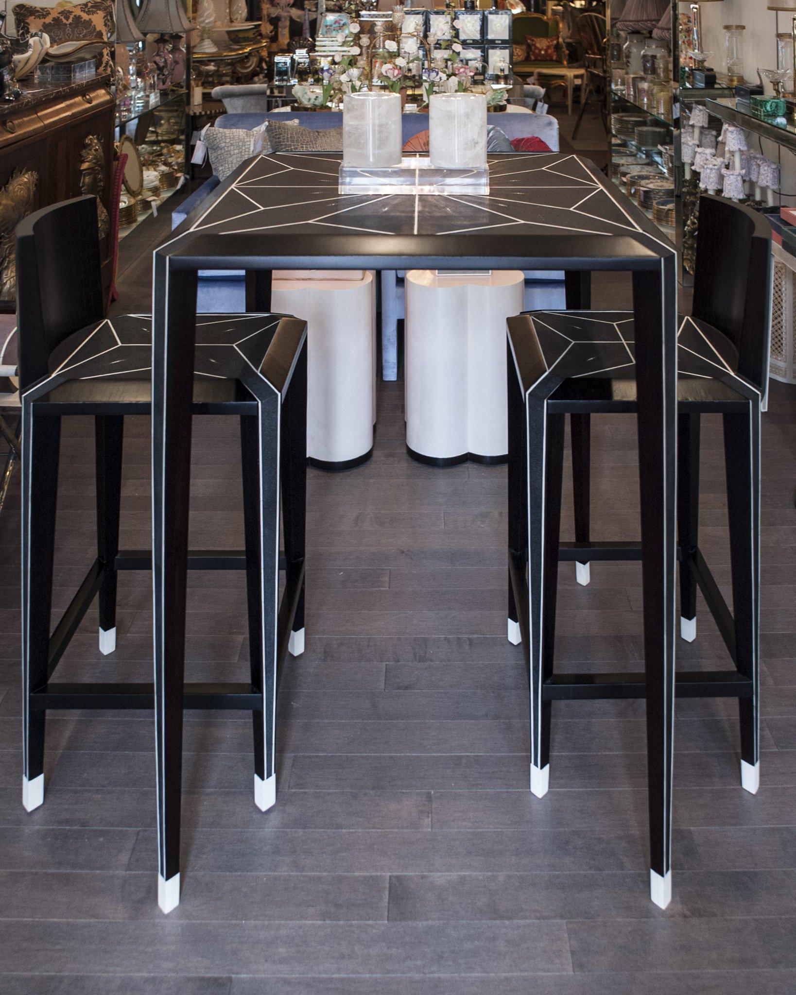Enjoy sipping on your favourite cocktail while seated at this Contemporary Authentic Shagreen bar table and bar chairs. The monochromatic palette and sleek modern lines exude sophistication, while the bone inlay details add refinement.