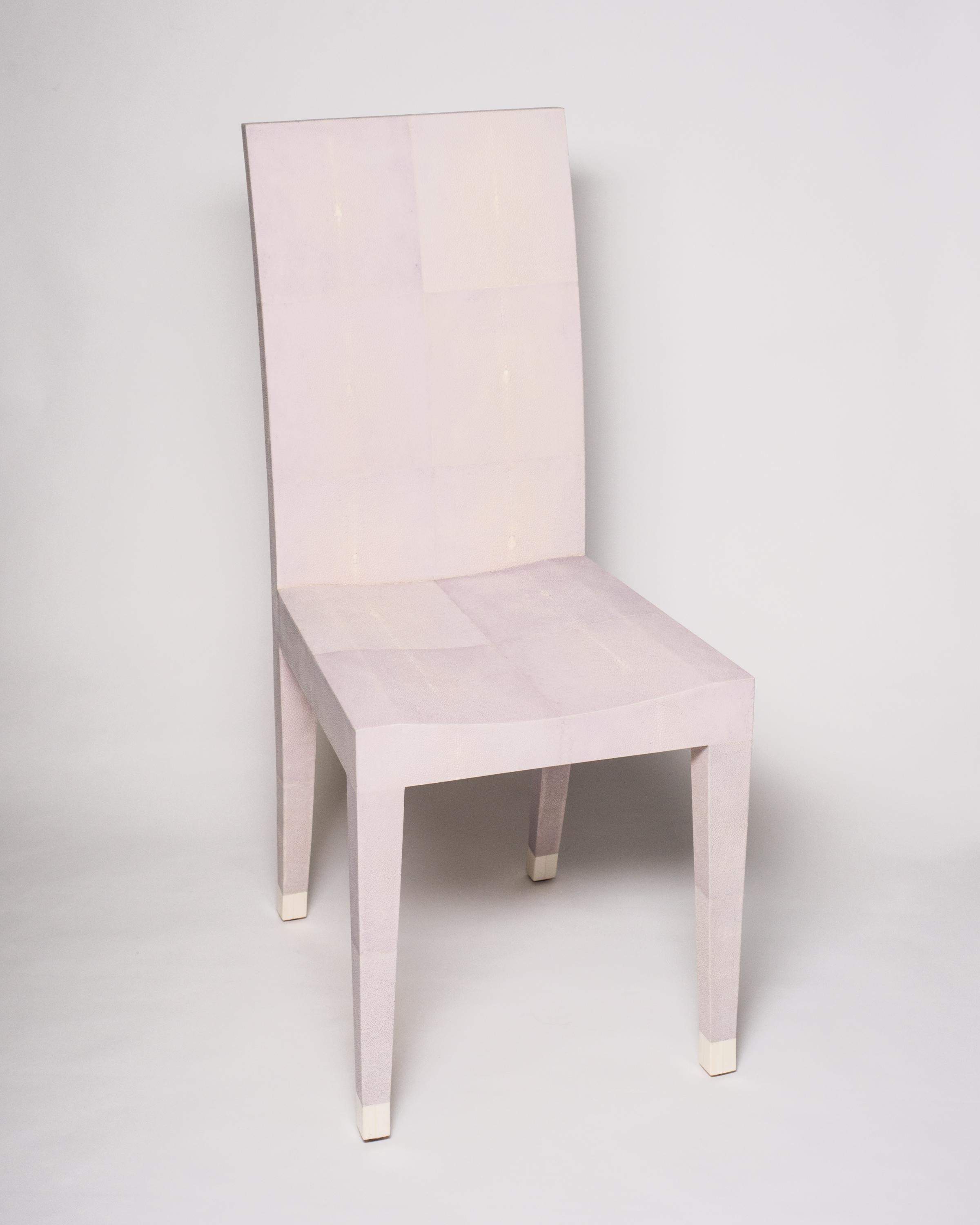 An authentic Shagreen lavender chair. The refined tapered leg is capped with a bone toe. This elegant, versatile, yet modern chair is well suited for a bathroom, a woman’s vanity or a desk.