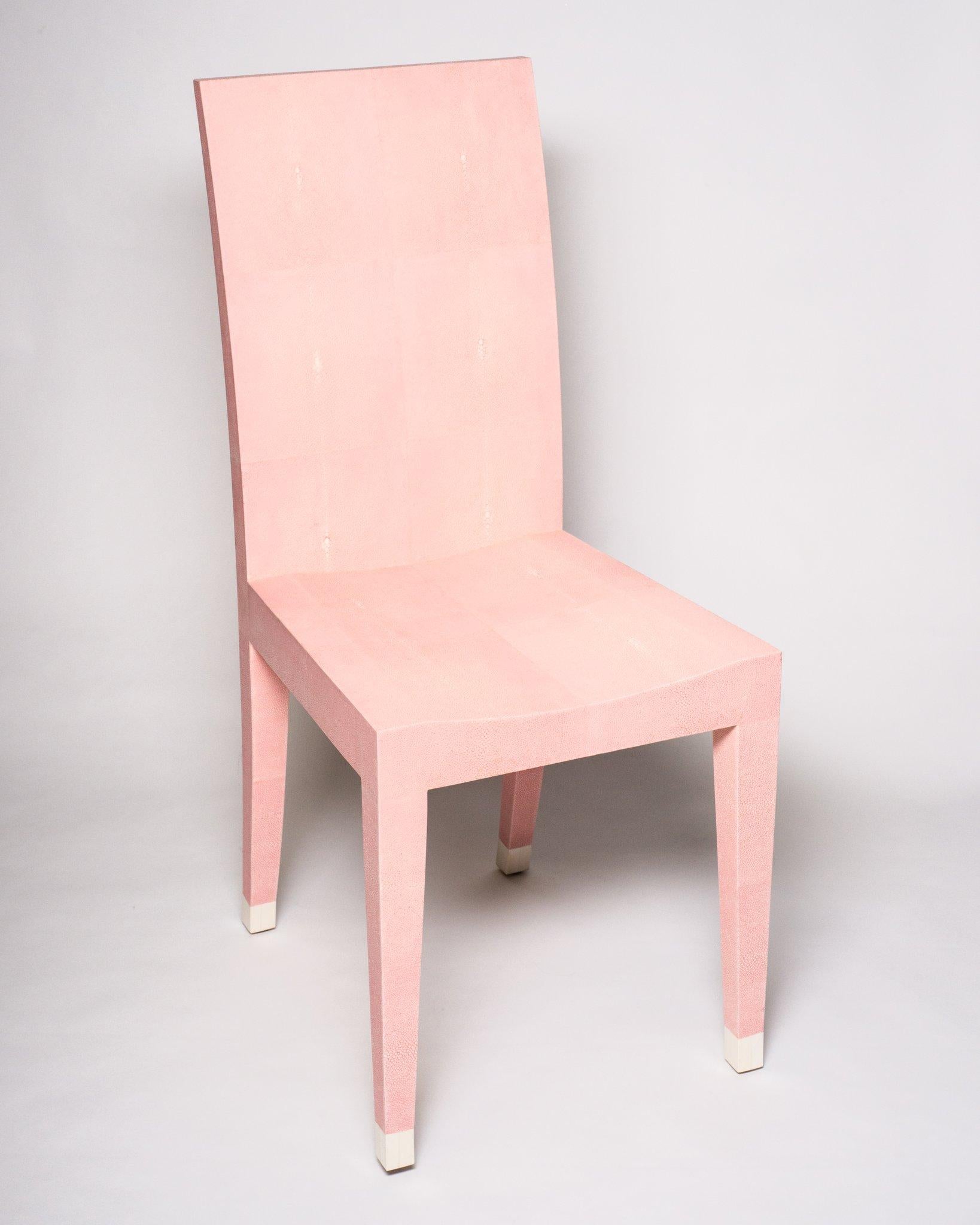 An authentic Shagreen Rose de Paris chair. Working with the vendor in Asia this particular genteel shade of pink called Rose de Paris was custom produced. The refined tapered leg is capped with a bone toe. This elegant, versatile, yet modern chair