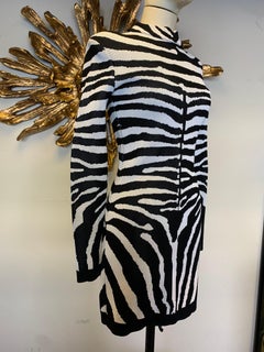 Mini robe contemporaine Balmain Power en maille à motifs zébrés