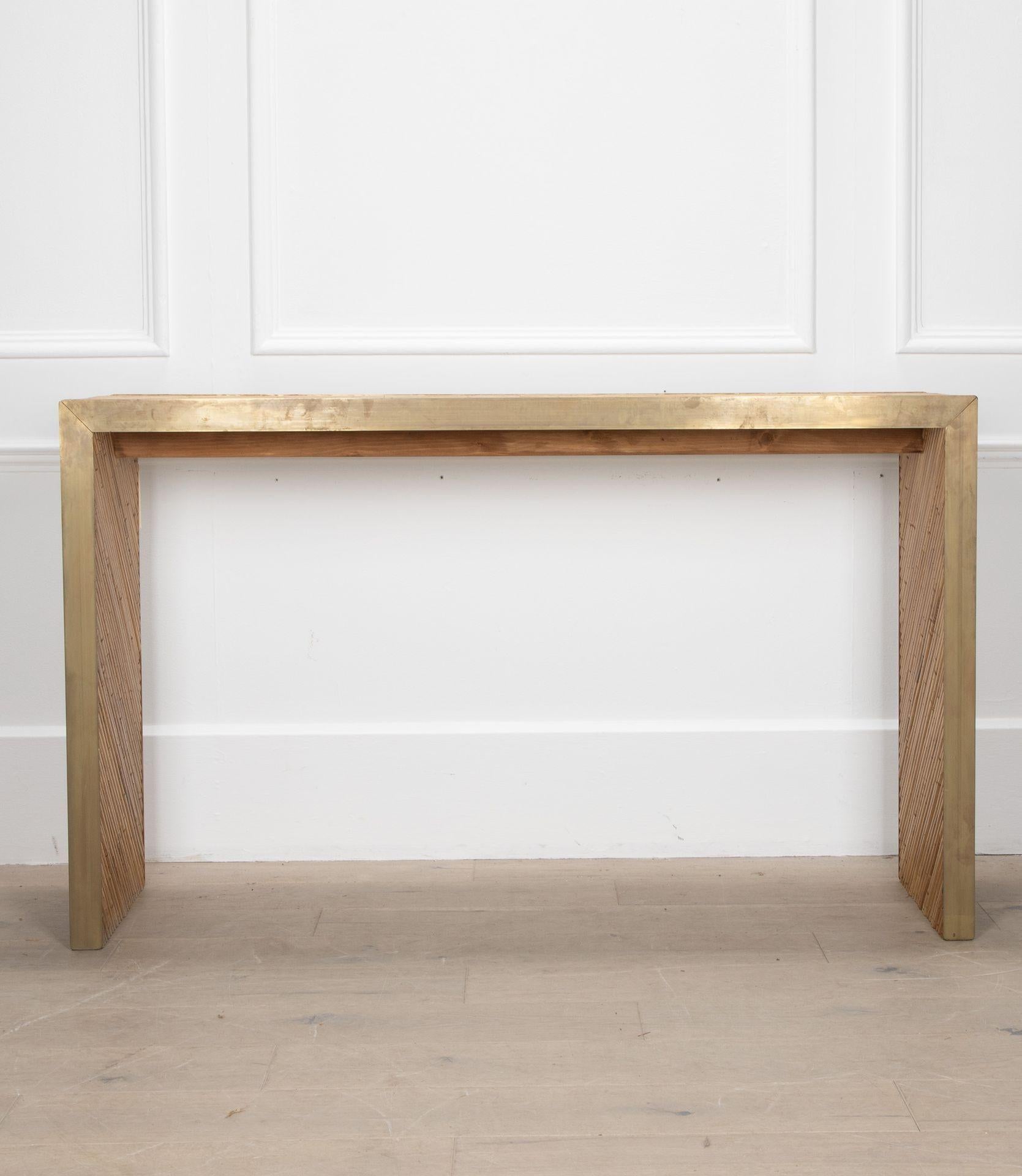 Lovely contemporary brass and bamboo console table in Mid Century style.