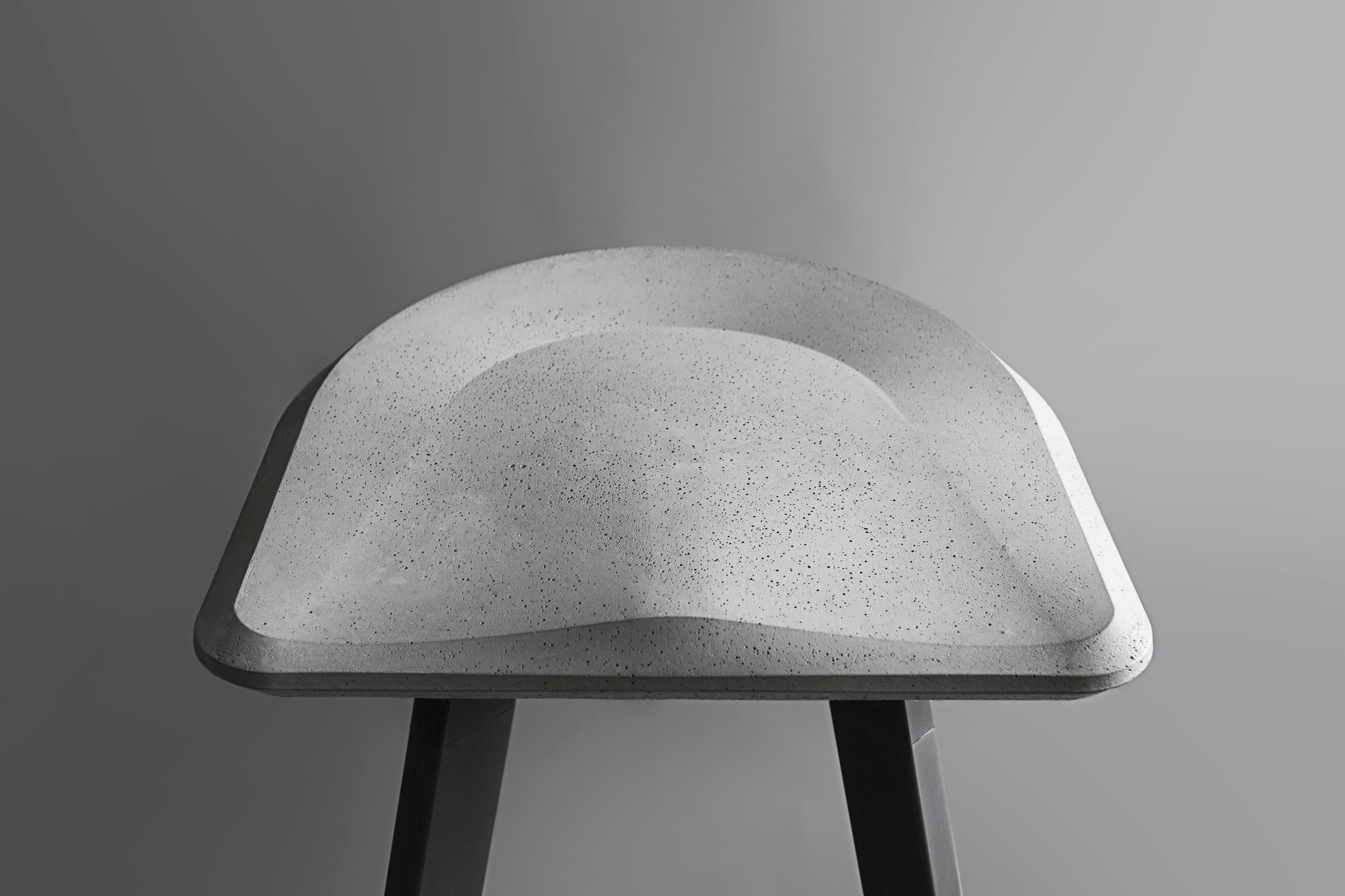 'A' is a bar stool made of concrete and aluminium
by Bentu Design

Dimensions: H 76.5cm x 46.5 x 46.5 cm


Bentu Design's furniture derives its uniqueness from the simplicity of its forms and its materials. Designed and manufactured by the designers