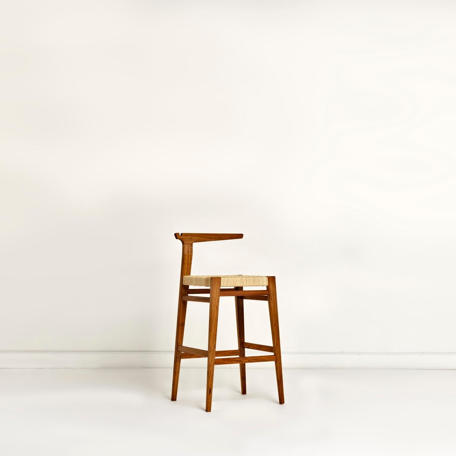 Contemporary bar stool in Brazilian hardwood and cord.

We named this chair 