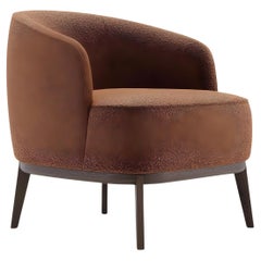 Poltrona a botte contemporanea in stile classico ed elegante