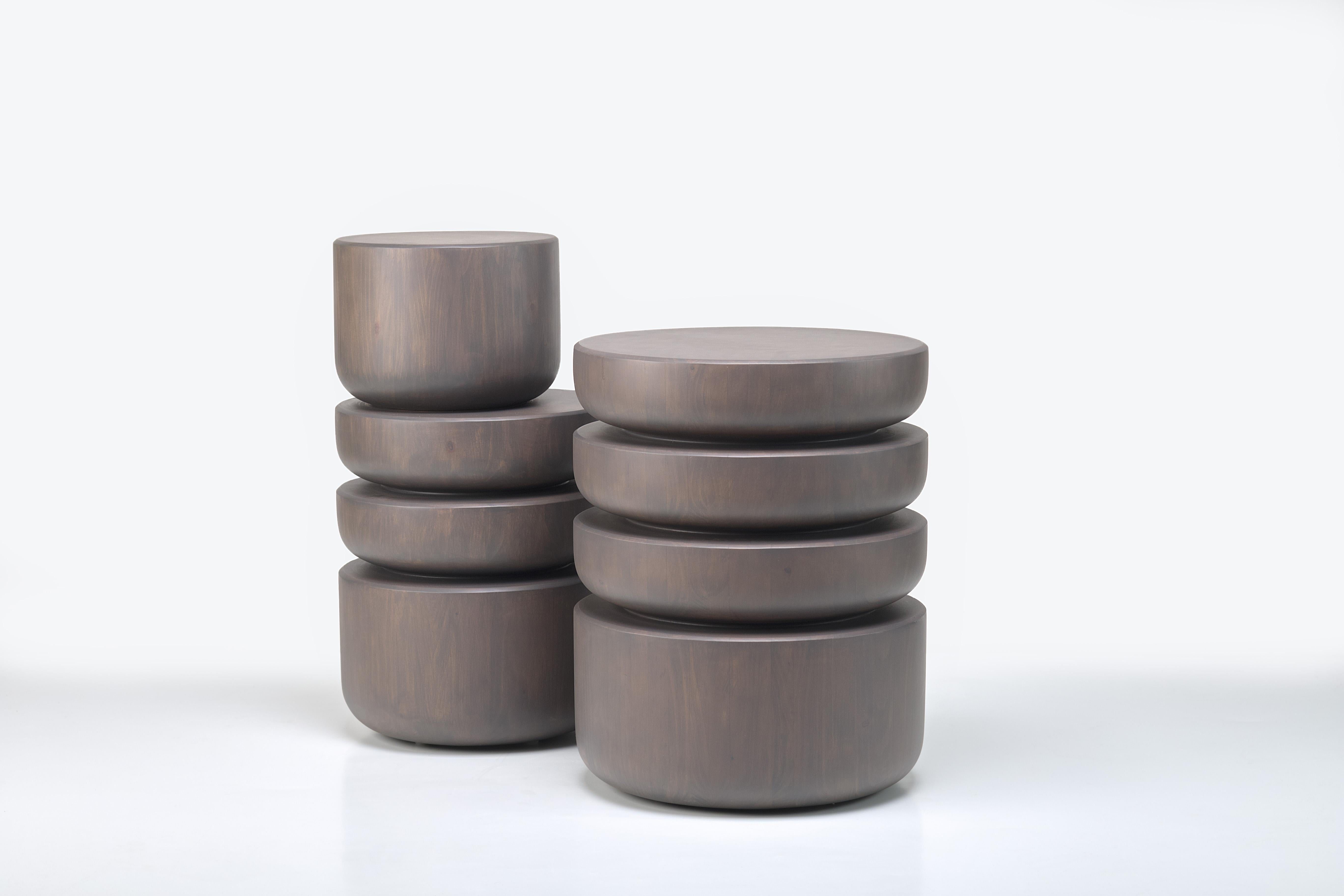 Revel in the rustic charm of our Barro Hand-Carved Table, a stunning homage to the artisanal heritage of the Chinautla region in Guatemala. Skillfully crafted to mirror the appearance of stacked clay pots and trays that are iconic to this region,
