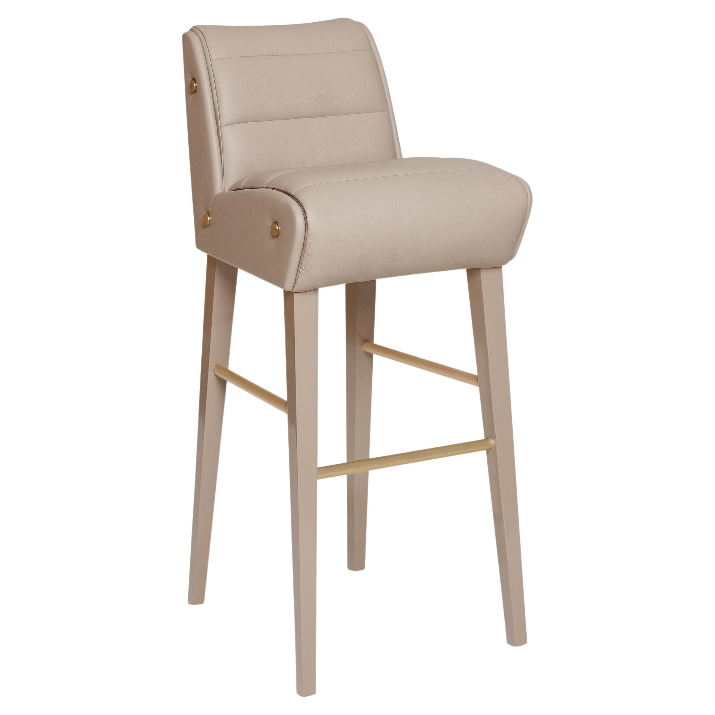 This barstool is an elevated homage to the golden age of gentleman drivers. The piece’s flawless structure is deceivingly simple, yet undeniably striking. The detailed upholstery and seaming bears the mark of true craftsmanship. Its sensuous lines