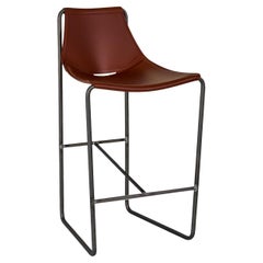 Sgabello da bar contemporaneo con base a slitta offerto in pelle