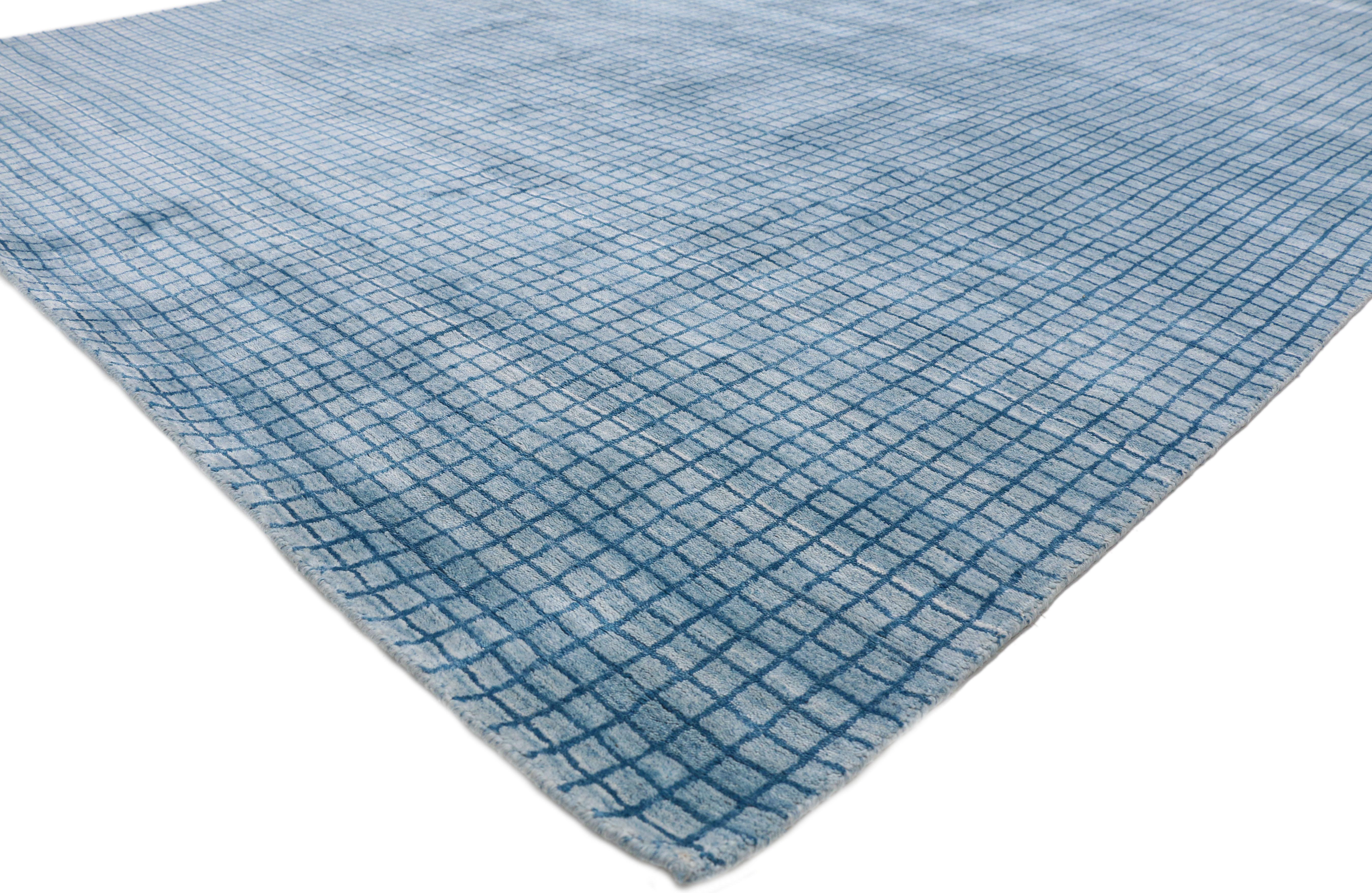 30433 New Contemporary Beach Style Area Rug with grid pattern and coastal living style. This new modern beach style area rug features a simplistic all-over geometric pattern spread across an abrashed light sky blue backdrop the dark cerulean lines