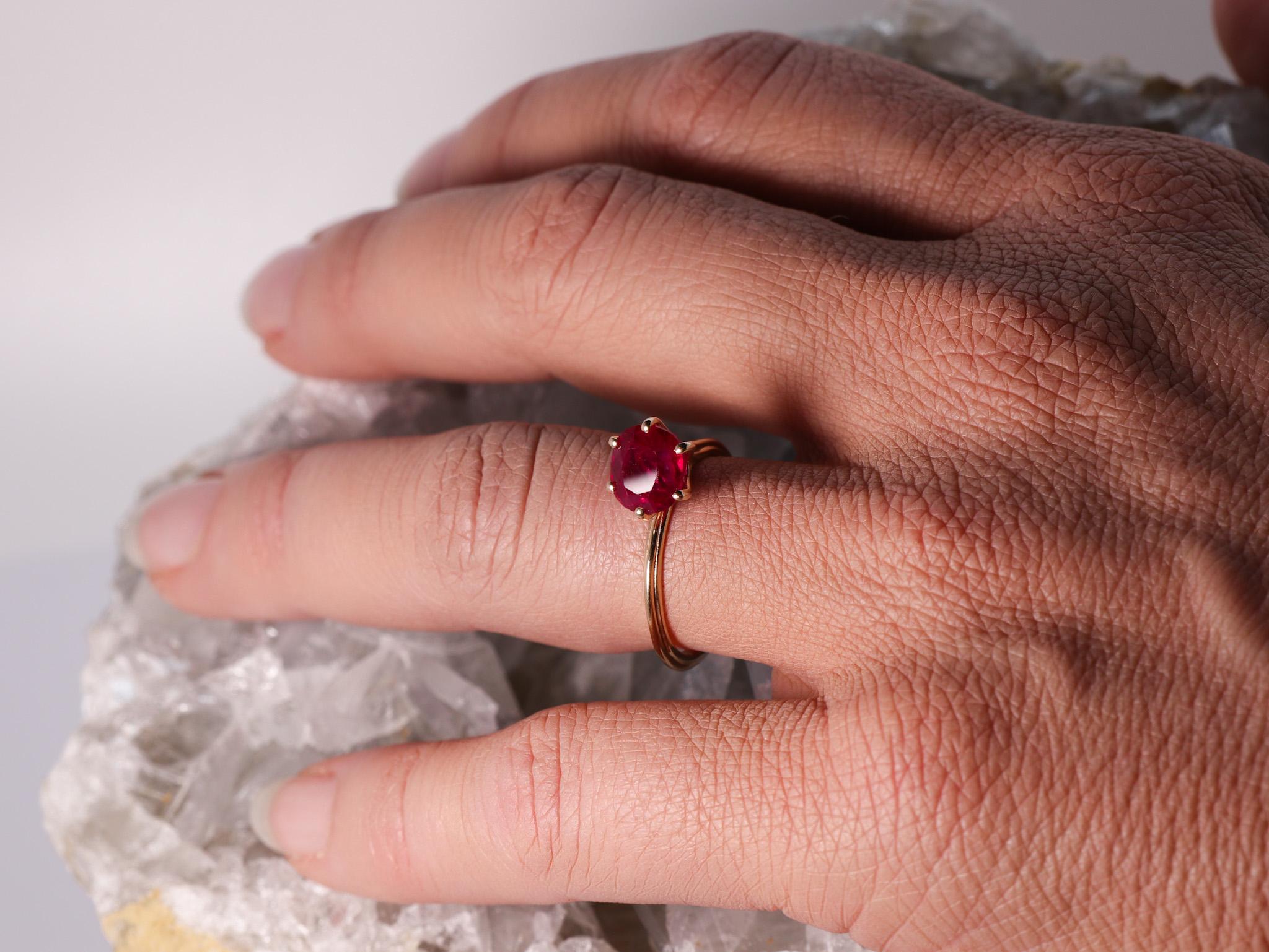 2.32 cts Burma Ruby 18k Rose Gold Stackable Asymmetrical Cosmic Design Ring.
The Egle ring is made of 18 karat rose gold and features a cushion mixed cut heated Burma ruby around 2.32 carats, which measures 7.5 mm by 6.7 mm. I personally bought this
