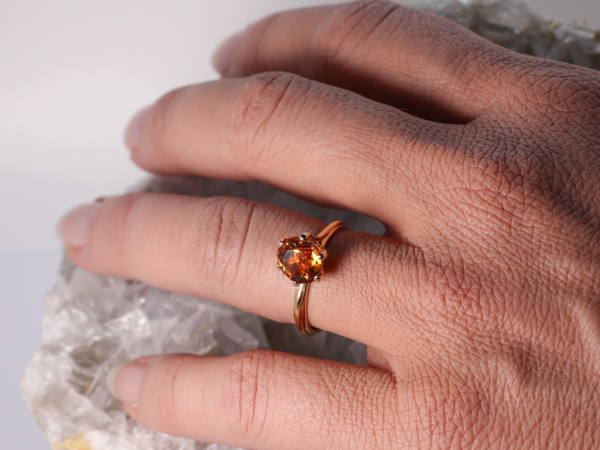 18K Rose Gold Asymmetric Cosmic Design Stackable Citrine Quartz Cocktail Ring.
The Egle ring is made of 18 karat  yellow gold and features a round mixed cut natural citrine quartz around 2.09 carats, diameter 7.95 mm. The total weight of the ring is
