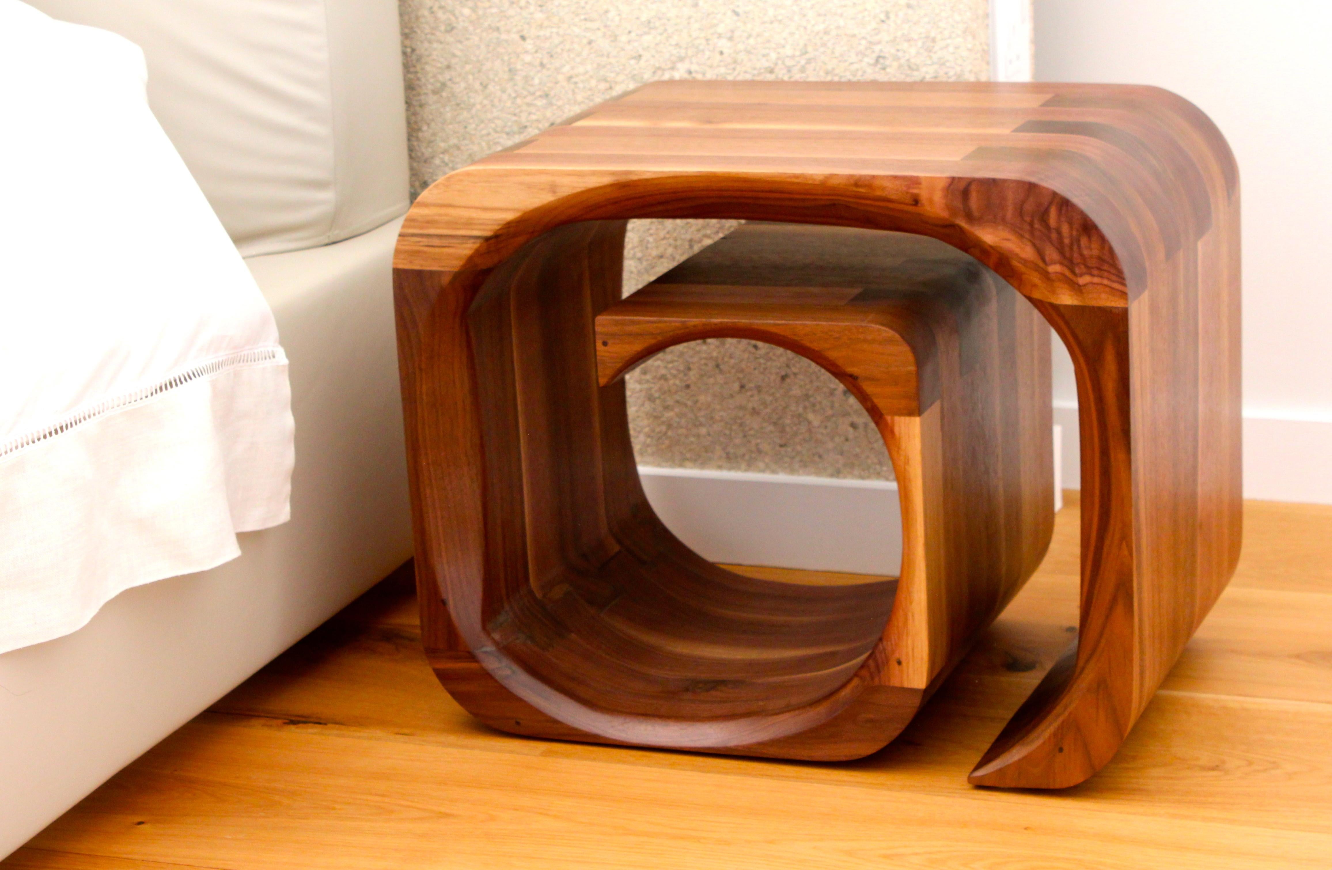 Two matching sculptural bedside tables in solid American black walnut, oil finish.
Sculptural bedside tables.
They can also be used on their sides. 
Bespoke sizes and different timbers available, please contact me to discuss.