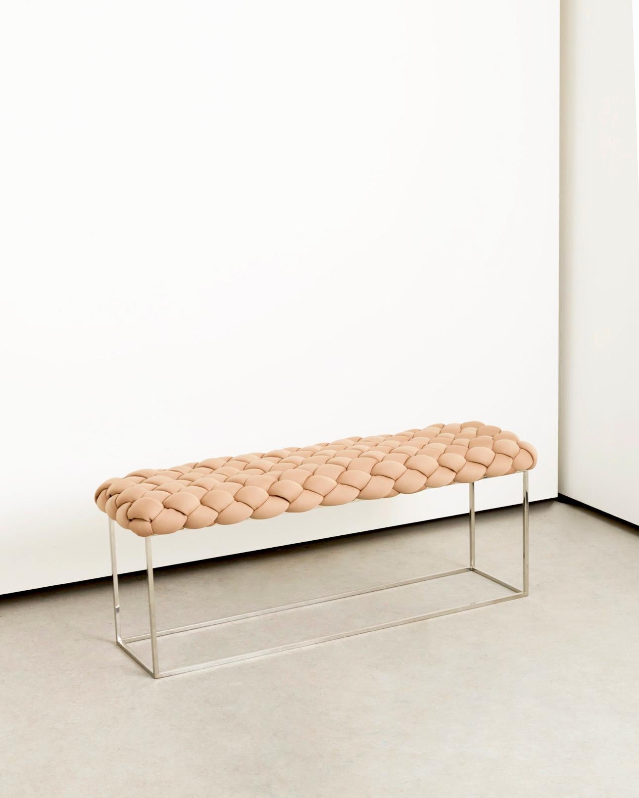 The Cloud collection was created around the concept of tress. Started in 2012 today it has a variety of pieces with different typologies .

V Benches are made with neoprene fabric and foam stripes, woven and stitched by hand. The metallic structure