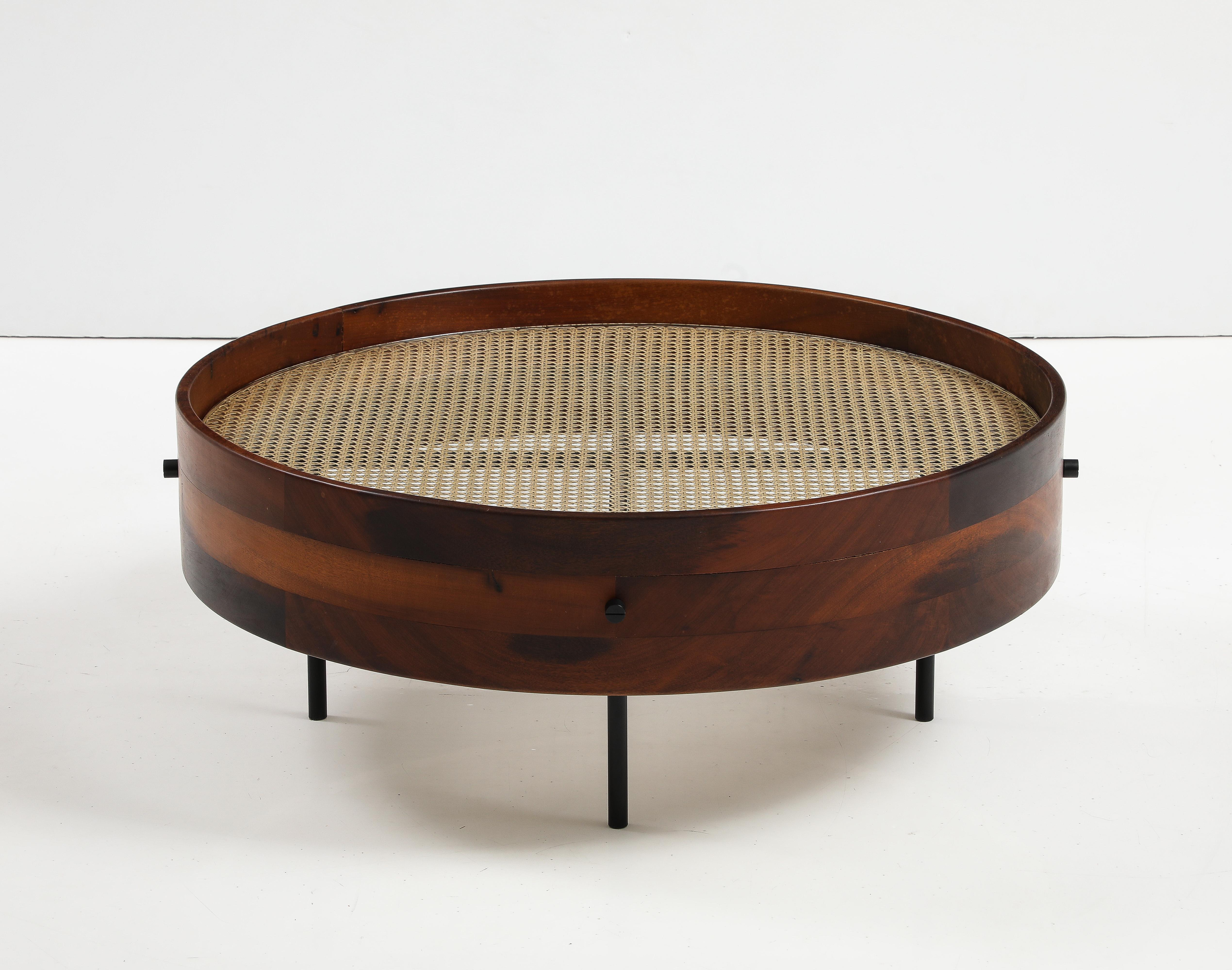 Contemporary “Bernardo” center table by Gustavo Bittencourt, Brazil, 2021.

Contemporary “Bernardo” center table made of solid wood, with straw and glass top. With four iron feet, this table was varnished keeping the characteristics of the wood.