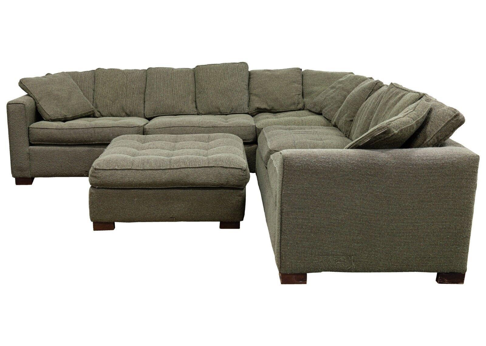 A Bernhardt taupe & green modular sectional with ottoman for Workbench Furniture. This cozy sofa sectional has a wonderful deep green color, very earthy and natural. This piece features a three piece set up; two symmetrical side sofas and a corner