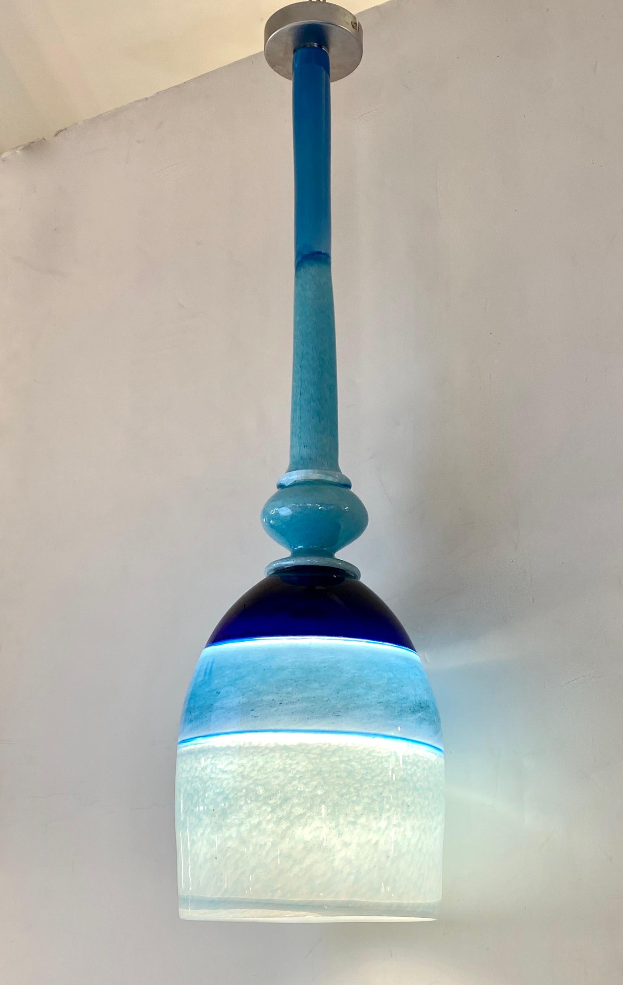 Fun and elegant Italian contemporary custom-made chandelier pendant light, entirely handmade, of organic modern design consisting of a blown Murano glass shade in 3 colors: black, turquoise, mottled aquamarine fused with the difficult incalmo