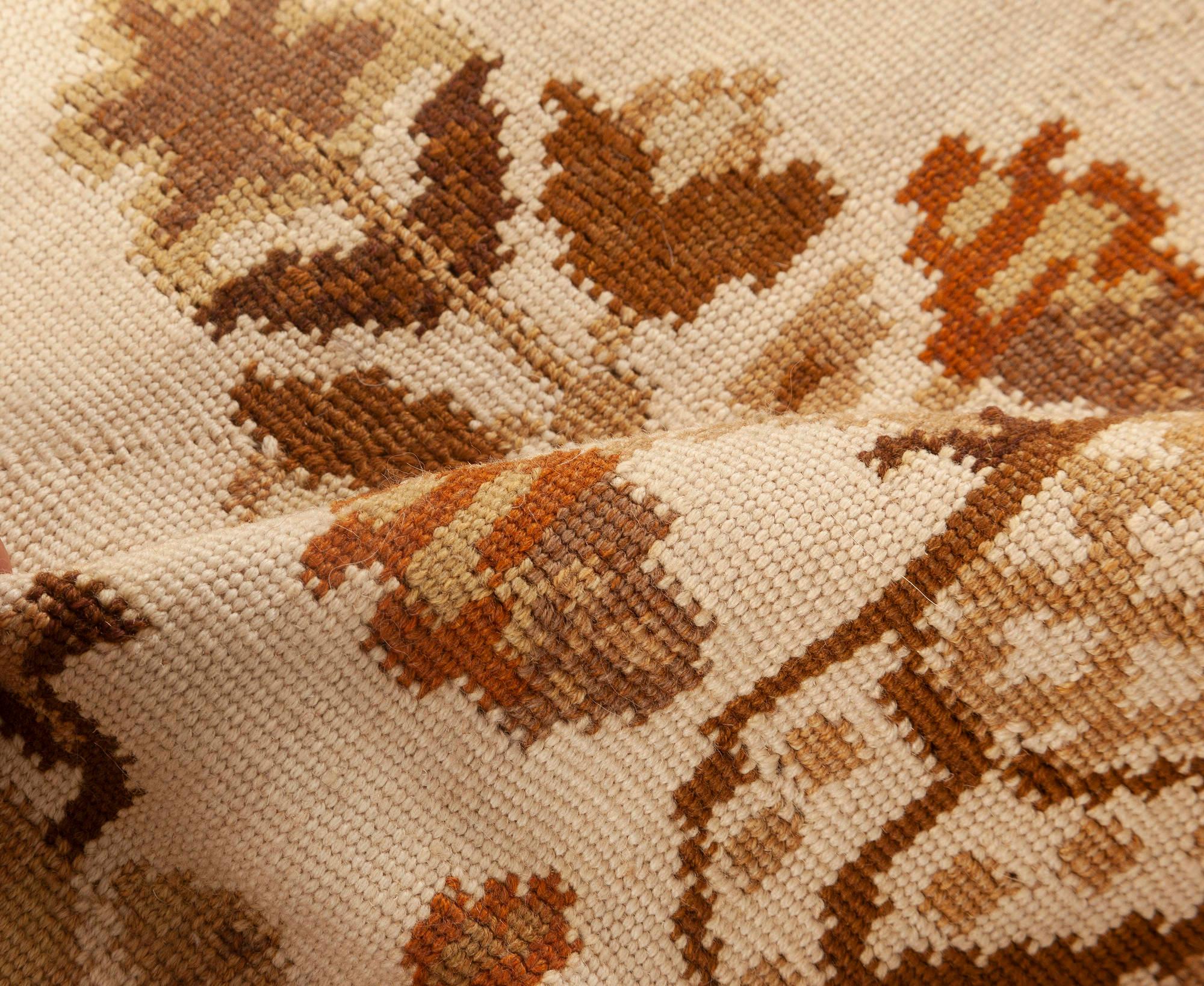 Contemporary Bessarabian style white, beige & brown wool rug by Doris Leslie Blau
Size: 9'6