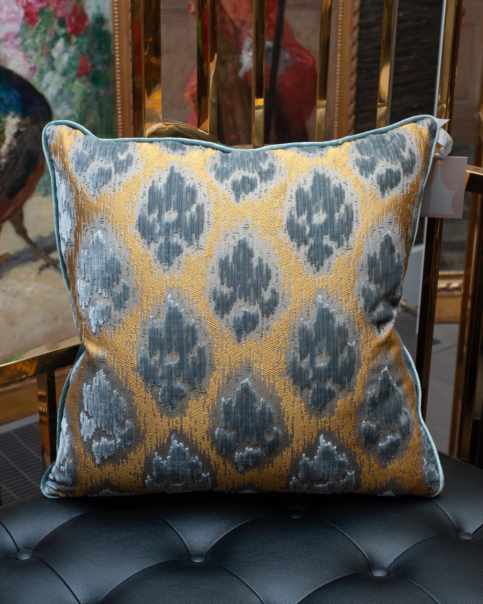 A Bevilacqua blue and gold silk velvet pillow with a silk velvet back and piped edge. Filled with Canadian feather and down.

Established by Luigi Bevilacqua, and operating out of Venice since 1875, Bevilacqua Tessuti produces the most exquisite