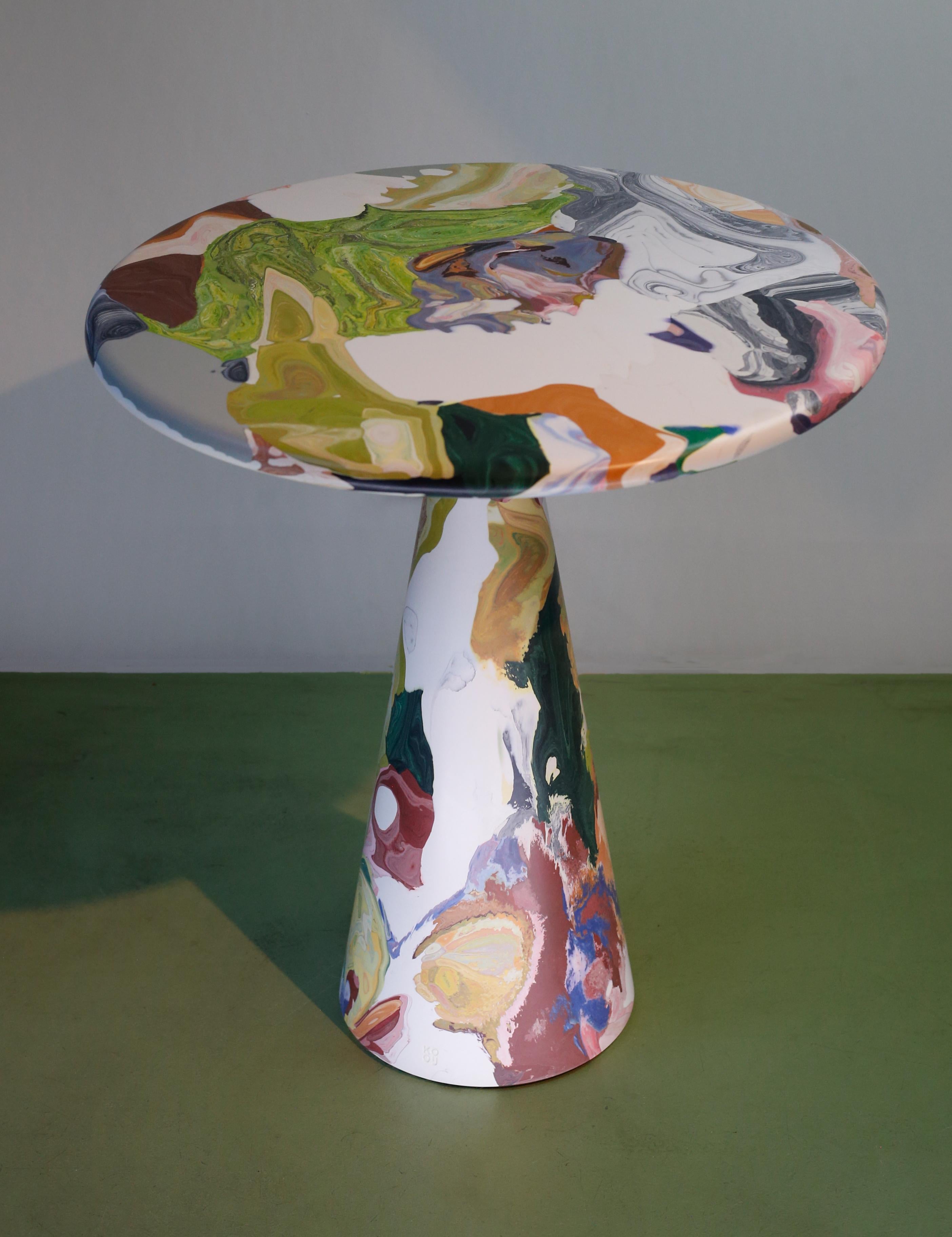 The Meltingpot table plays a keystone role in the circular design practice at Kooij. Discarded recycled plastic prototypes, production faults, and colour tests form the basis of the conglomerate Meltingpot. These multiform elements are curated and