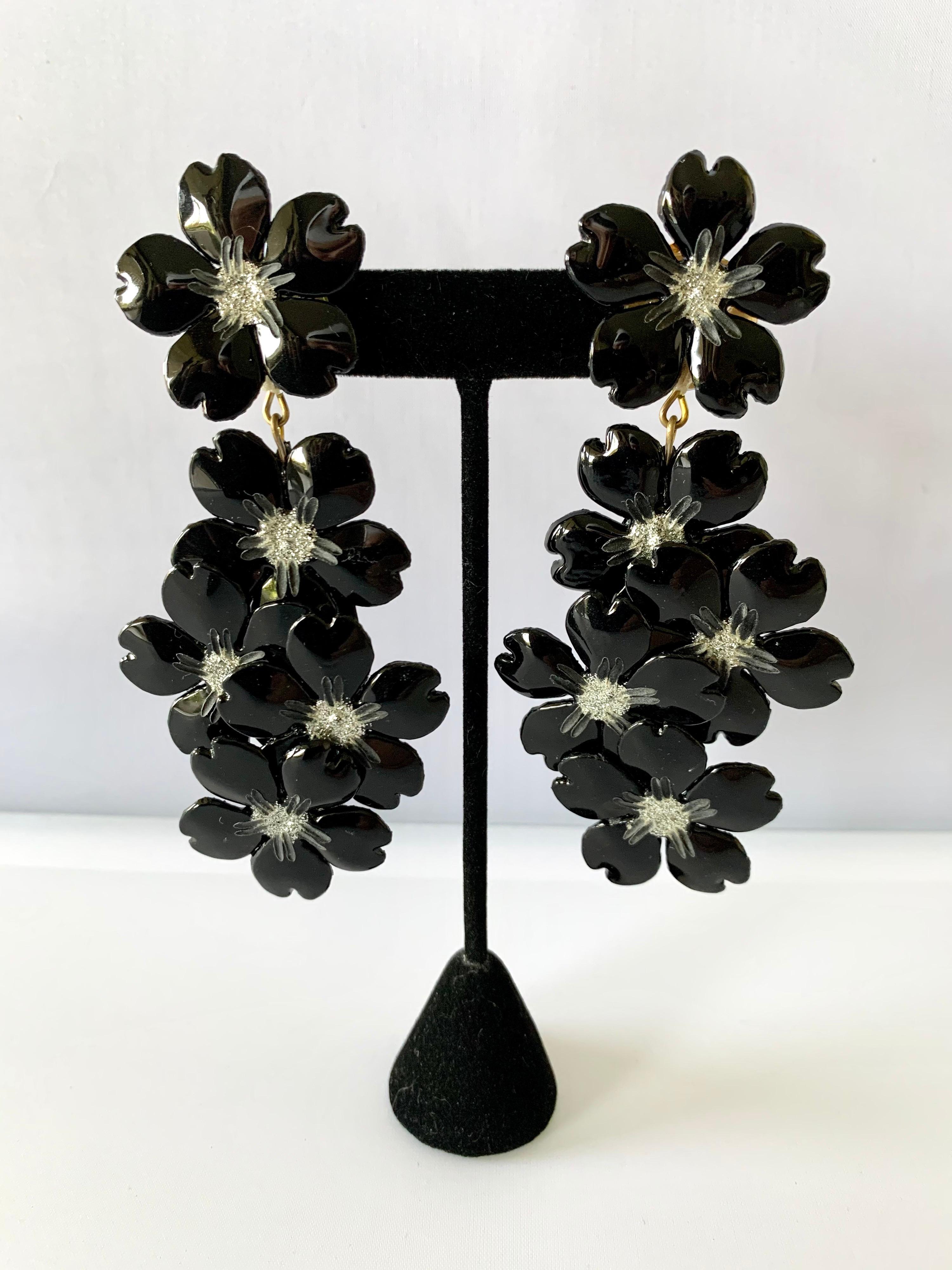 French designer black flower chandelier statement clip-on earrings made in Paris by Cilea - the lightweight chic earrings are comprised of enameline (enamel and resin) and feature a bold/unique design with exquisite hand-applied details Cilea Paris