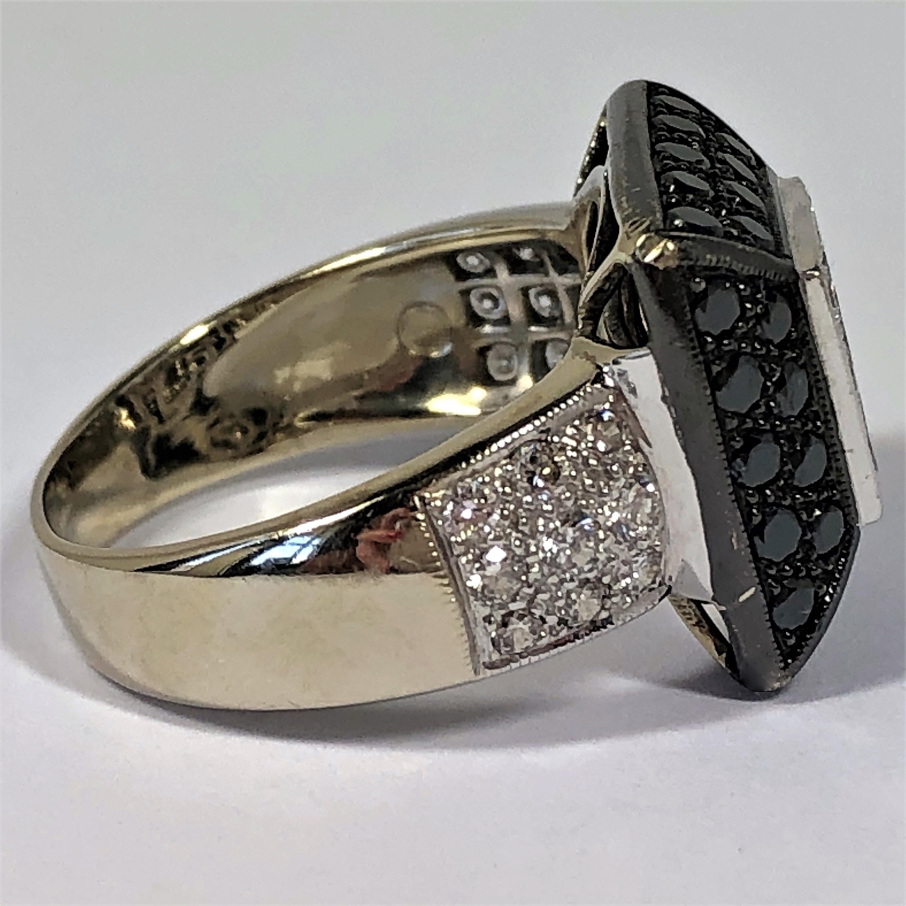 Round Cut Contemporary Black and White Diamond Ring in White Gold