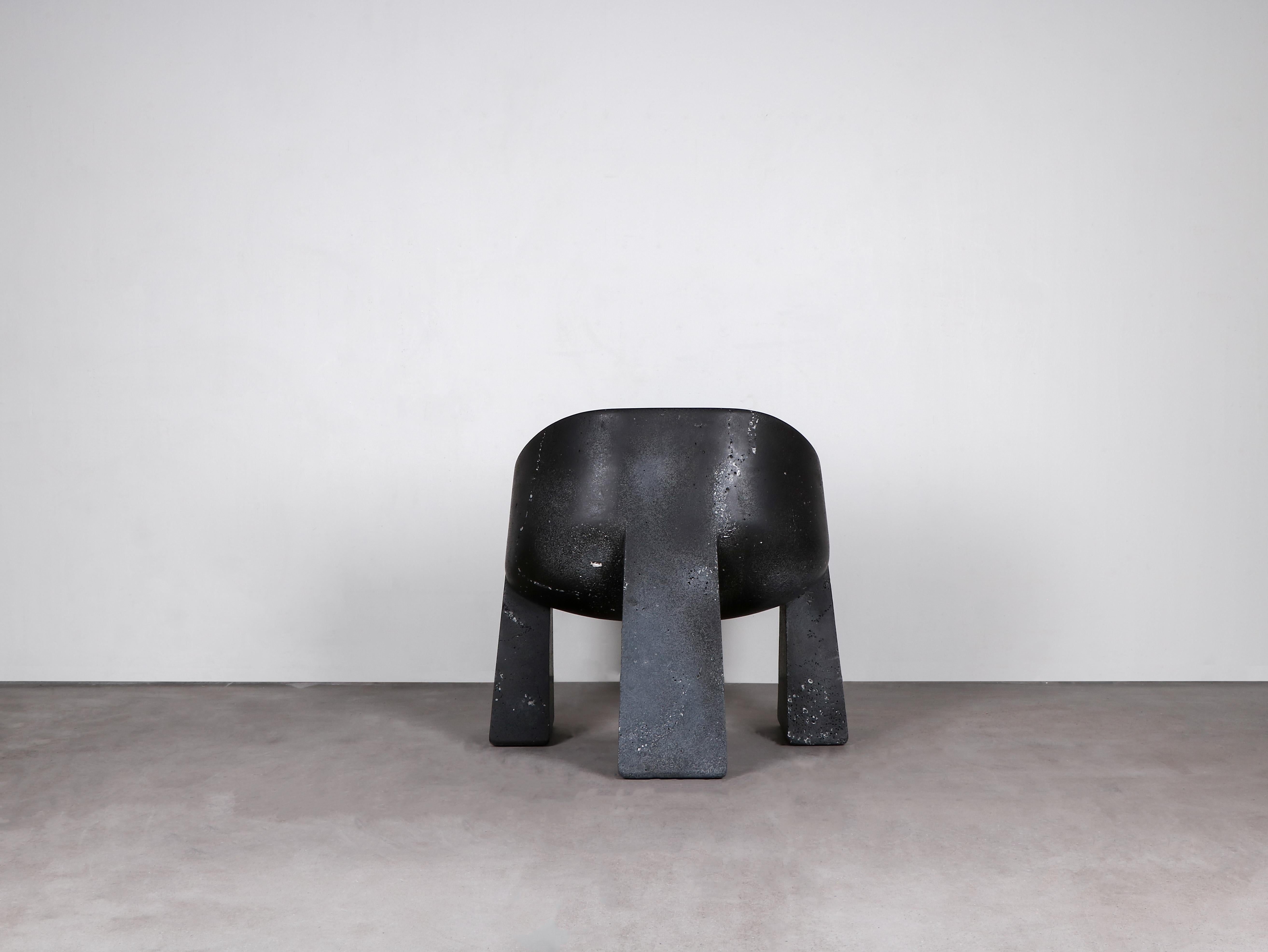 Contemporary Black Armchair in Basalt - Klot Basalt Chair by Lucas Morten

2022
Limited edition of 6 + 1 AP
Dimensions (cm): H 57 D 65 W 60
Material: Basalt

Klot chair came from a complex journey through the world of geometry. in the search