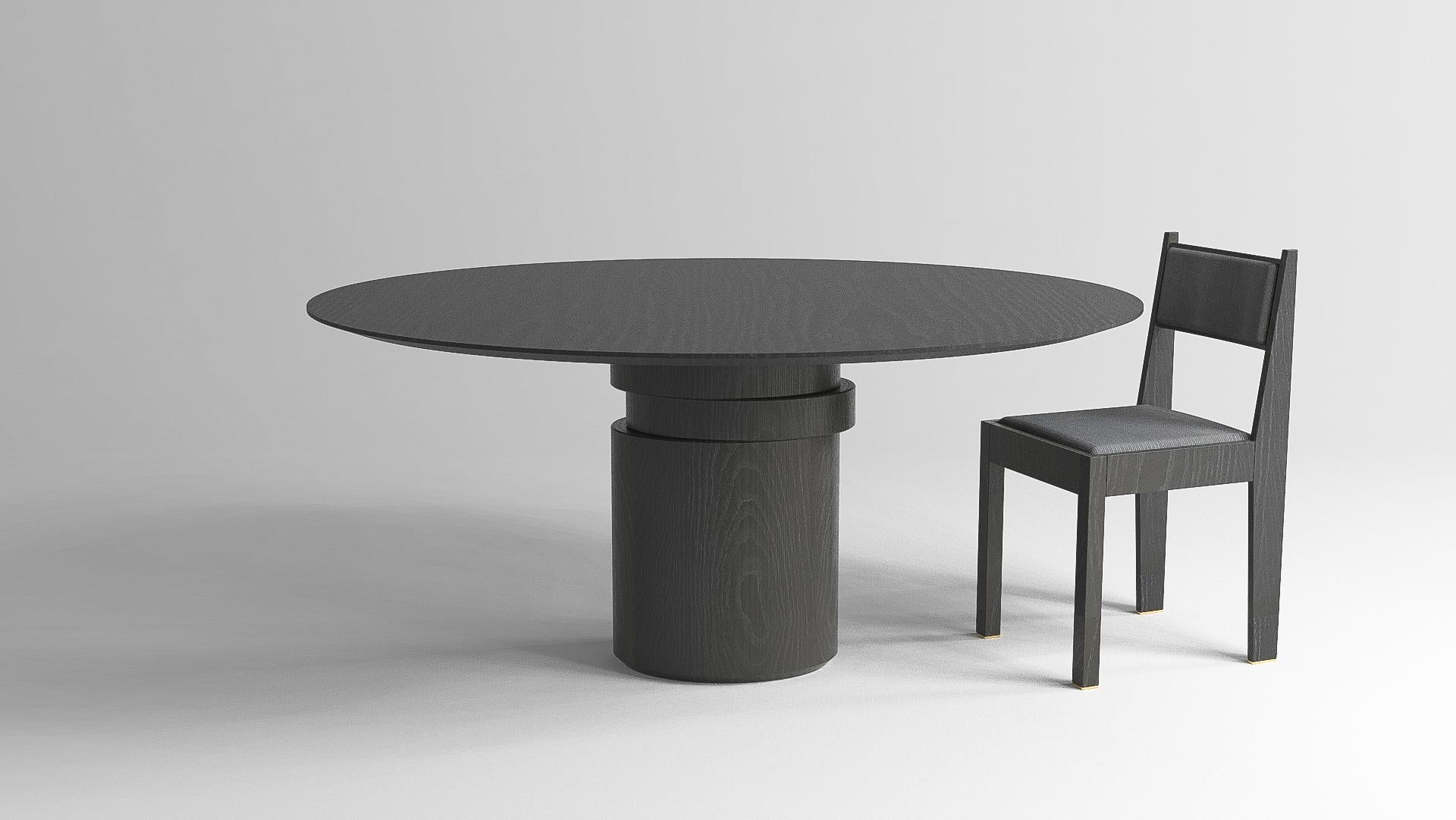 Contemporary round dining table, black ash wood, shifting disc, Belgian design In New Condition For Sale In Antwerp, Antwerp