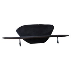 Contemporary black burned and sculpted bench