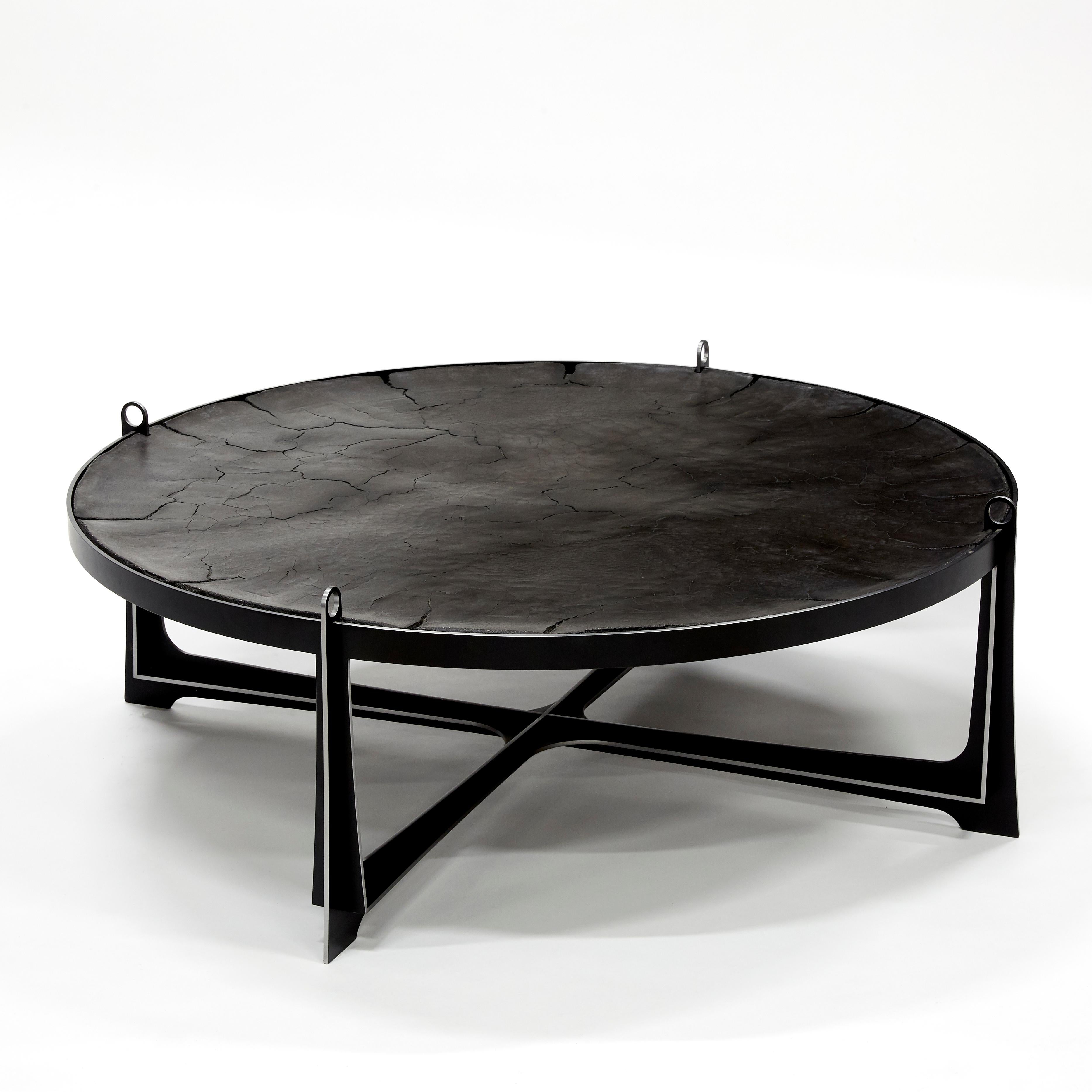 Erwan Boulloud (né en 1973)
Table basse Atacama
MATERIAL : Ciment fissuré anthracite, base en acier noir
Dimensions : Ø 120 cm - H 40 cm
Année : 2024
Fabriqué en France
Numéroté 1/8, signé 


Artiste, Design/One et Artisan français, diplômé de