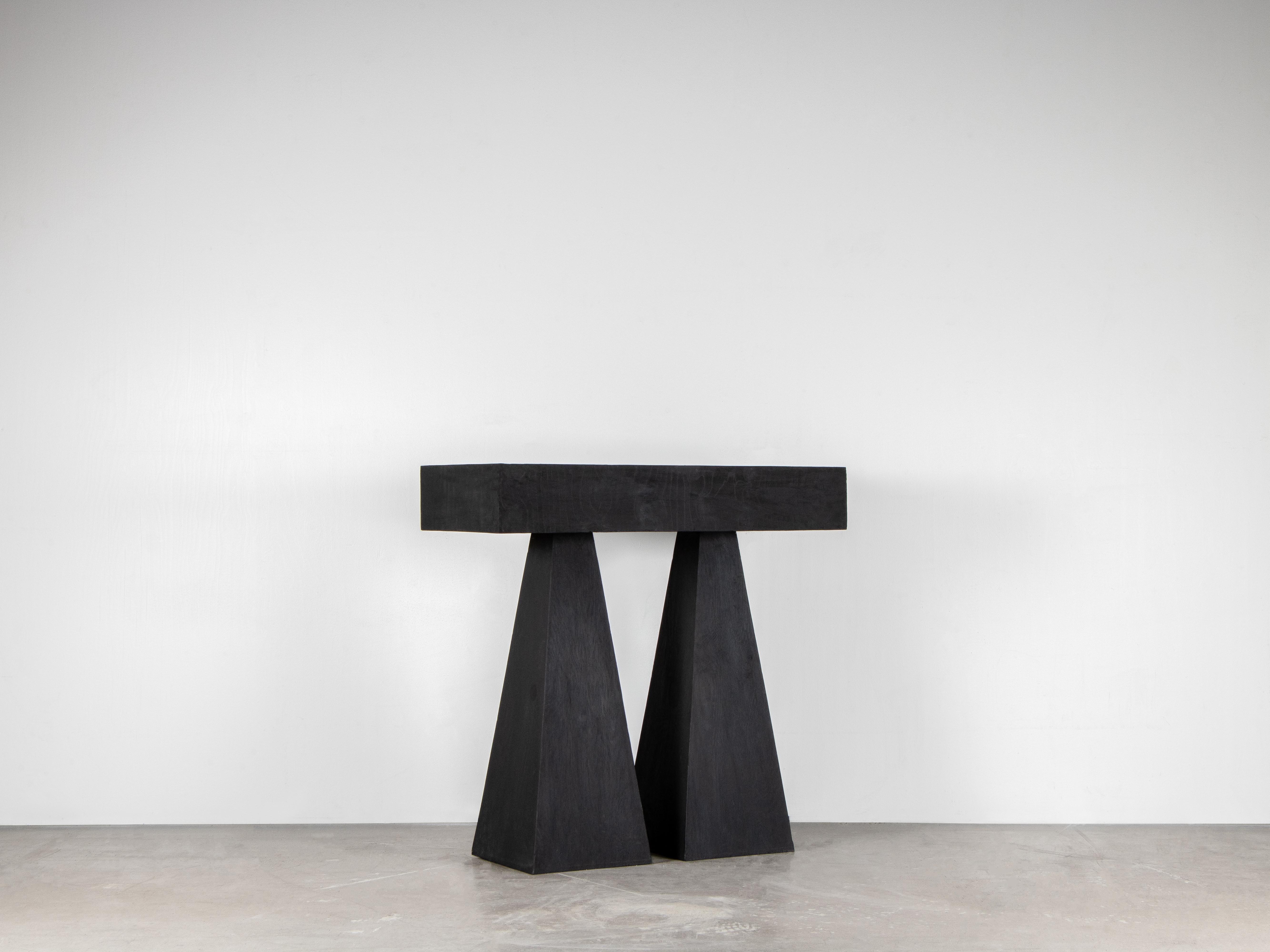 Contemporary Black Console Table in Hand-Waxed Plywood - Torn Table by Lucas Morten

2018
Limited edition of 29 +1 AP
Dimensions (cm): W 90,5 H 89 D 40
Material: hand-waxed plywood

Torn table with its two individual legs symbolizes the