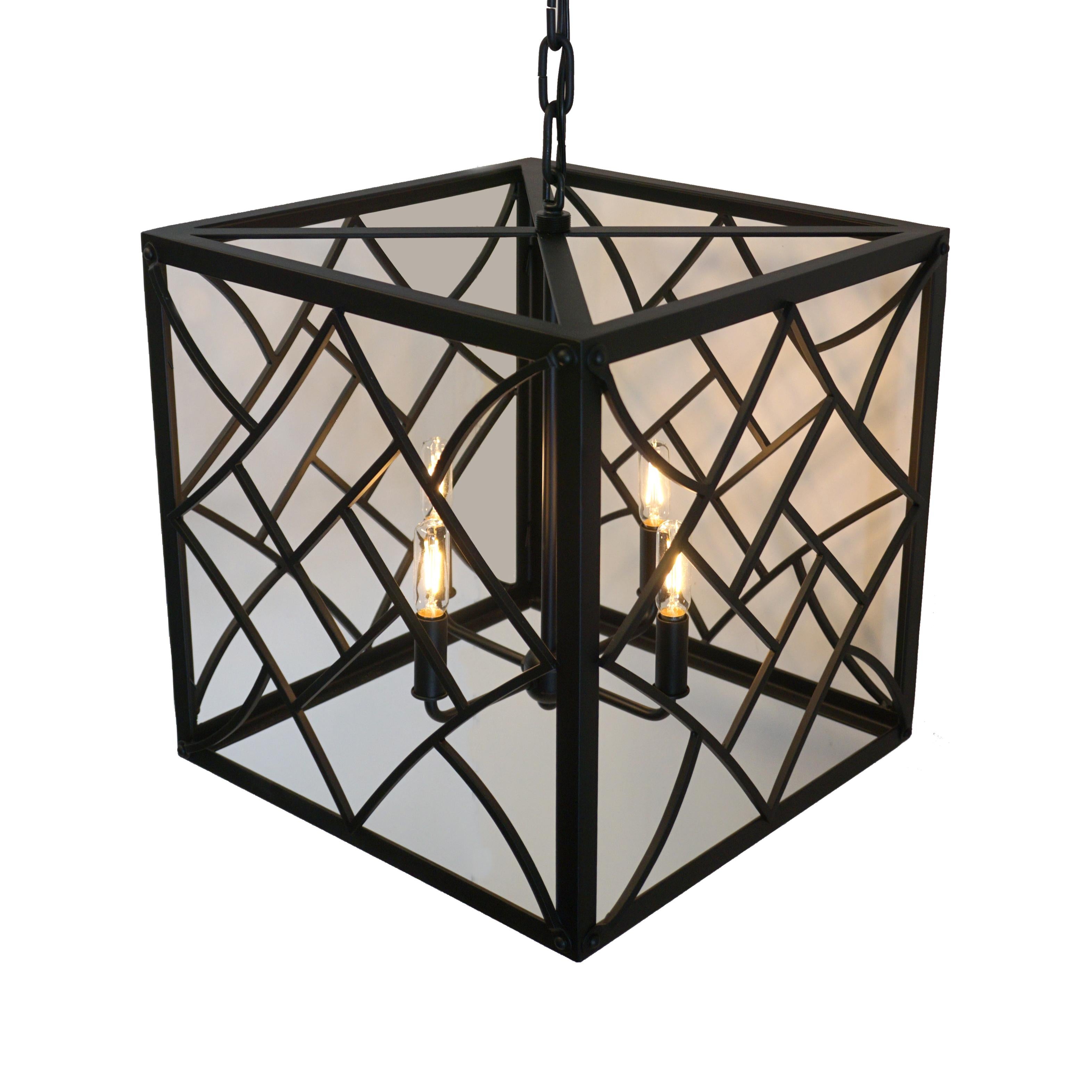 Evoking the Art Deco style of the 1920s and 1930s, our Nouveau cube pendant features bold geometric shapes and a chevron motif. 

Lantern shown in SBLC Black finish.
The Black finish and no glass create a contemporary look.

Handcrafted in wrought